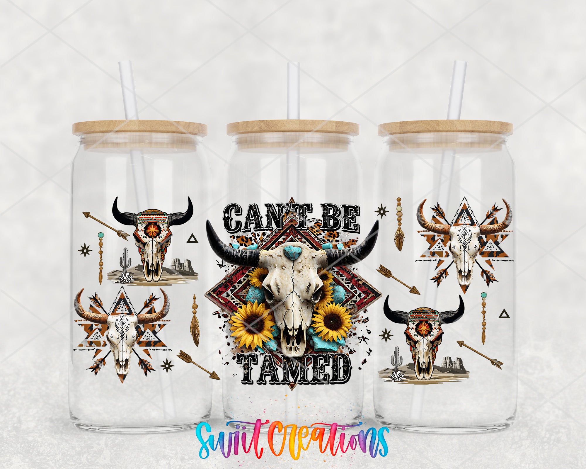 three glass tumblers with various designs and text on them.