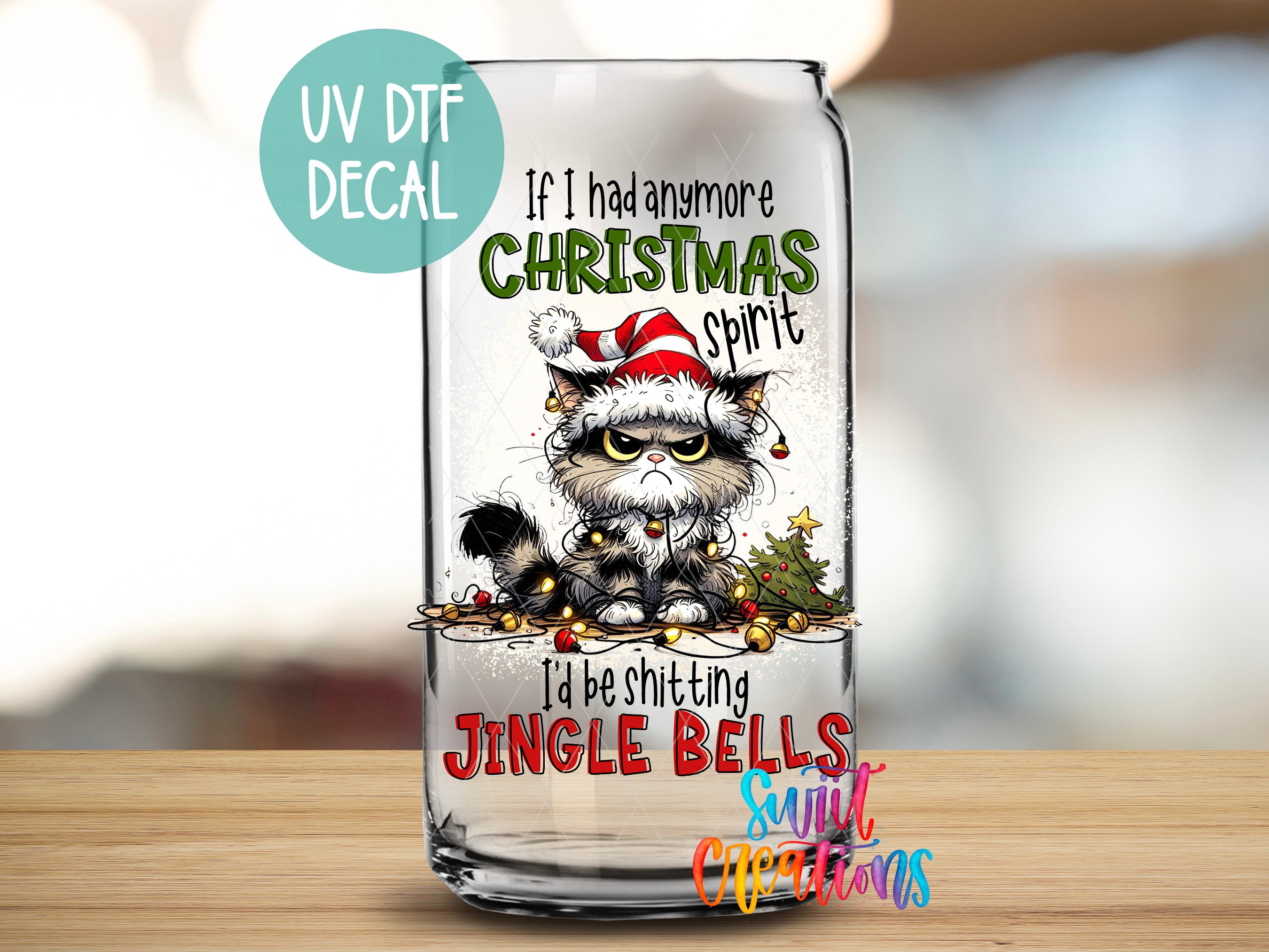 a glass with a picture of a cat wearing a santa hat