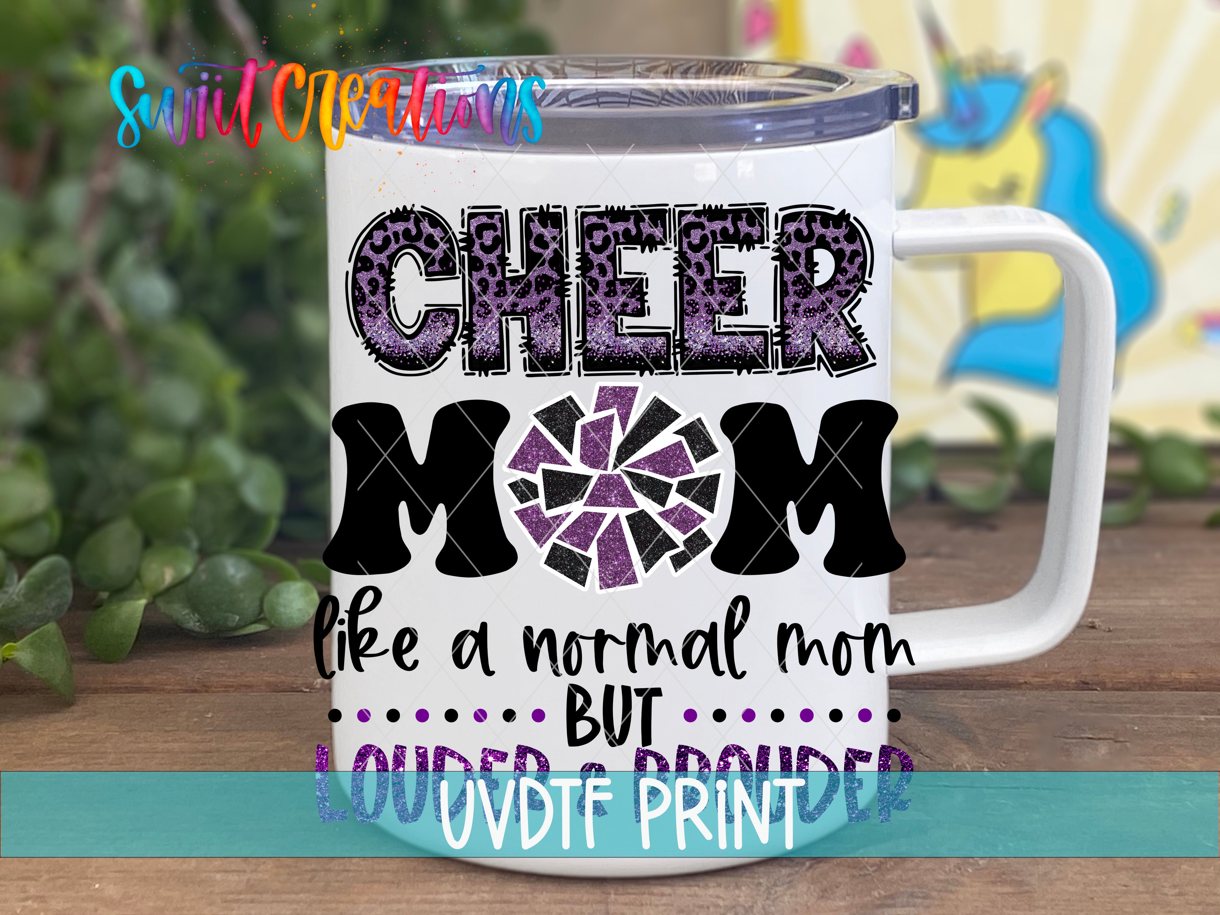 A white mug with a printed design that says "CHEER MOM LIKE A NORMAL MOM BUT LOUDER PROUD".