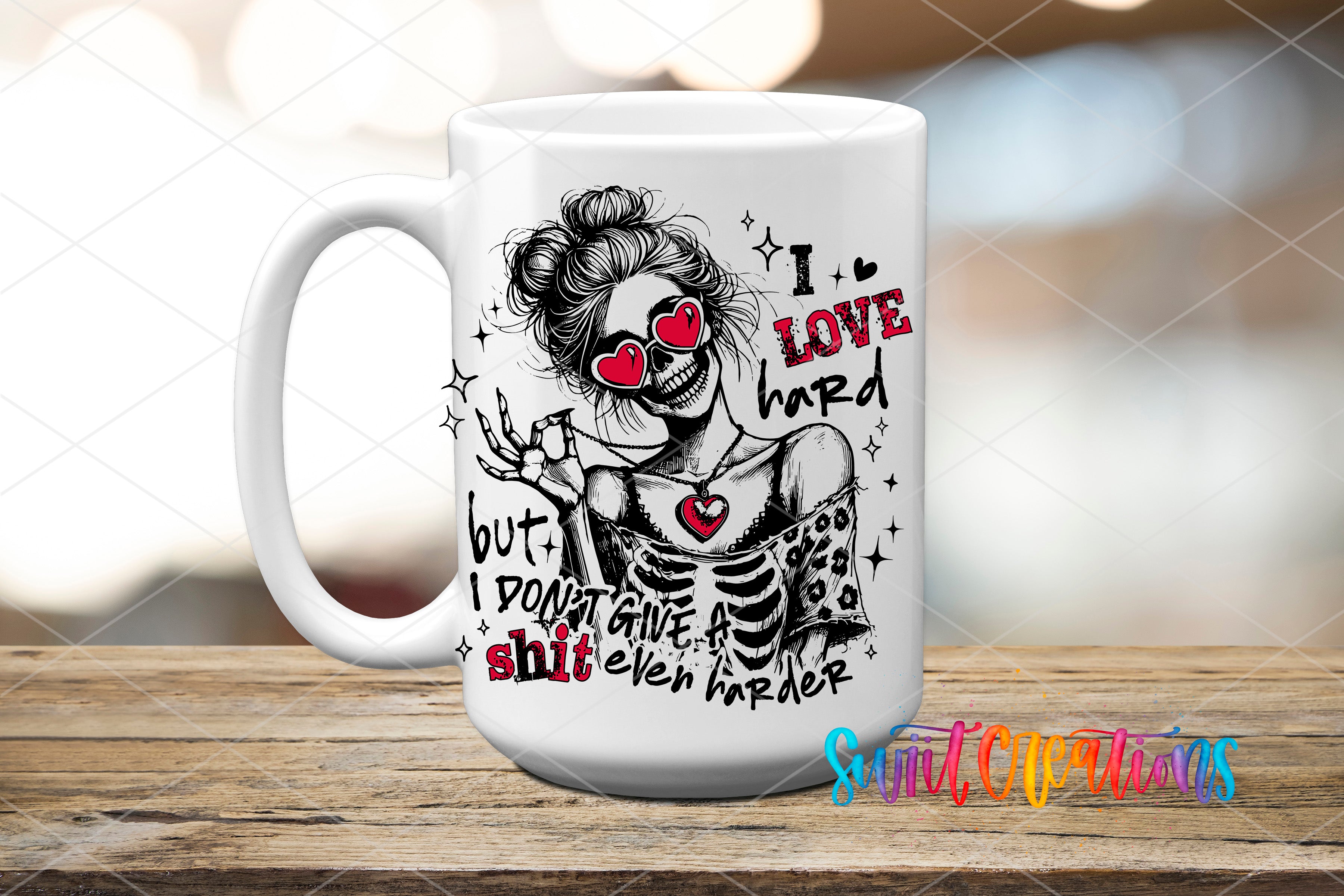 A white ceramic mug with a black and white illustration of a woman with a skull-like face, wearing sunglasses and holding a guitar. The mug has text and graphics on it, including the phrases "I love hard" and "but I don't give a shit".