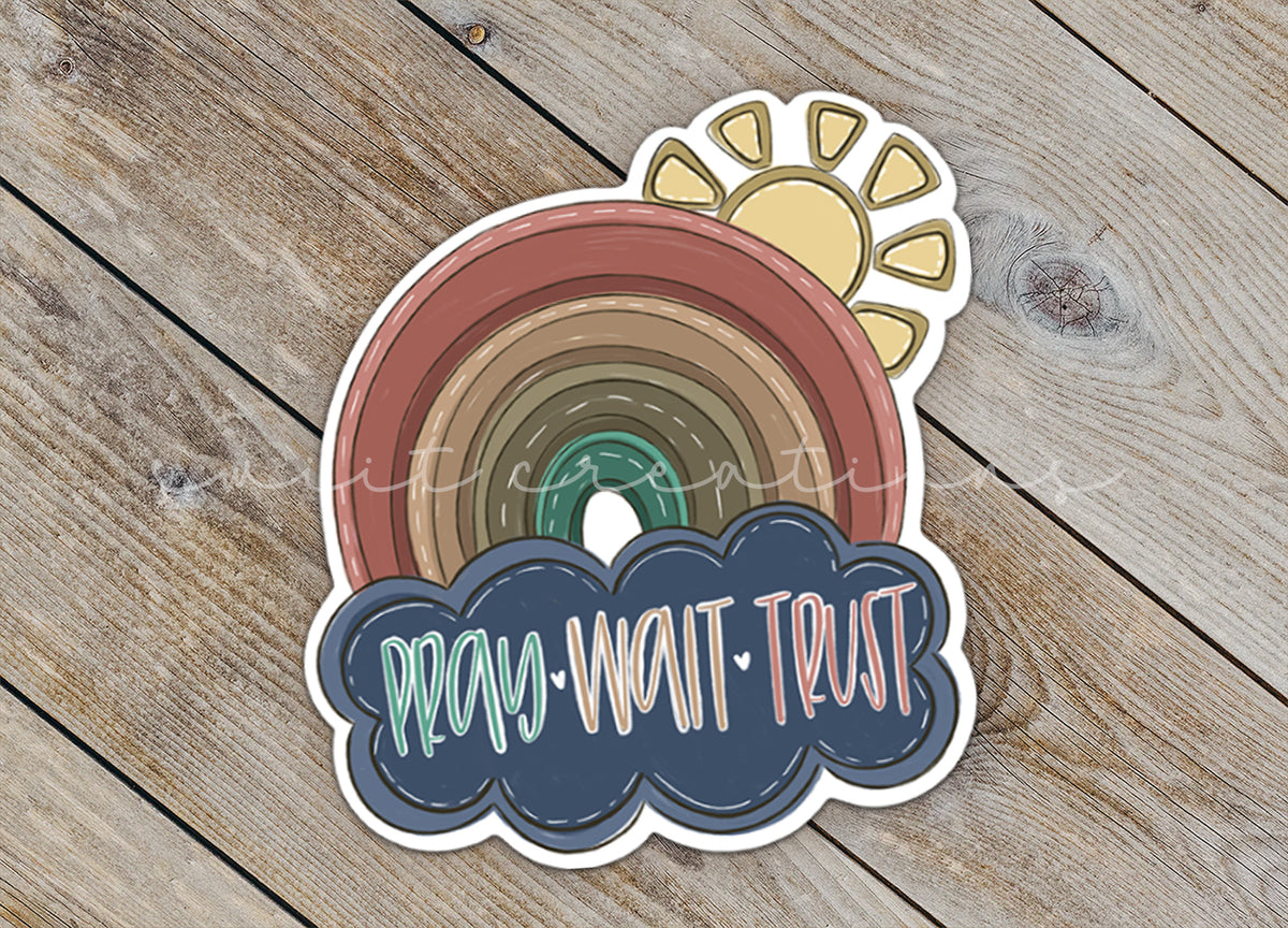 a sticker with a rainbow and a cloud on it
