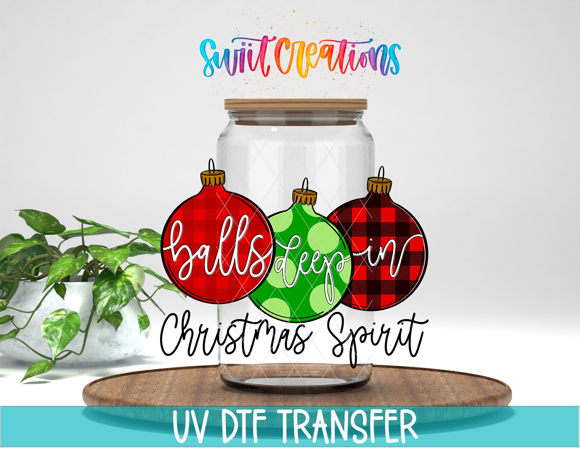 a clear glass jar with three Christmas ornaments, including a red ball, a green ball with polka dots, and a red and black plaid ball. The text above the jar reads "Swift Creations" and "balls keep in Christmas spirit". The image also includes a UV DFT Transfer watermark at the bottom.