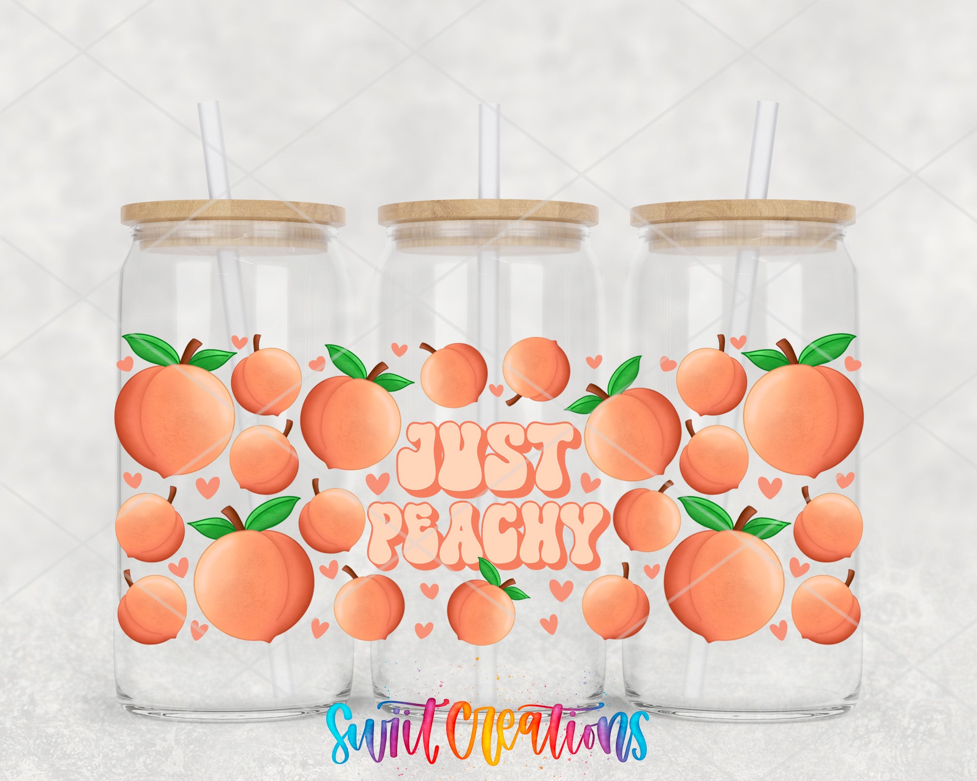 Three glass jars with wooden lids, each containing a straw. The jars are decorated with illustrations of peaches and the text "Just Peachy" written in a playful font.