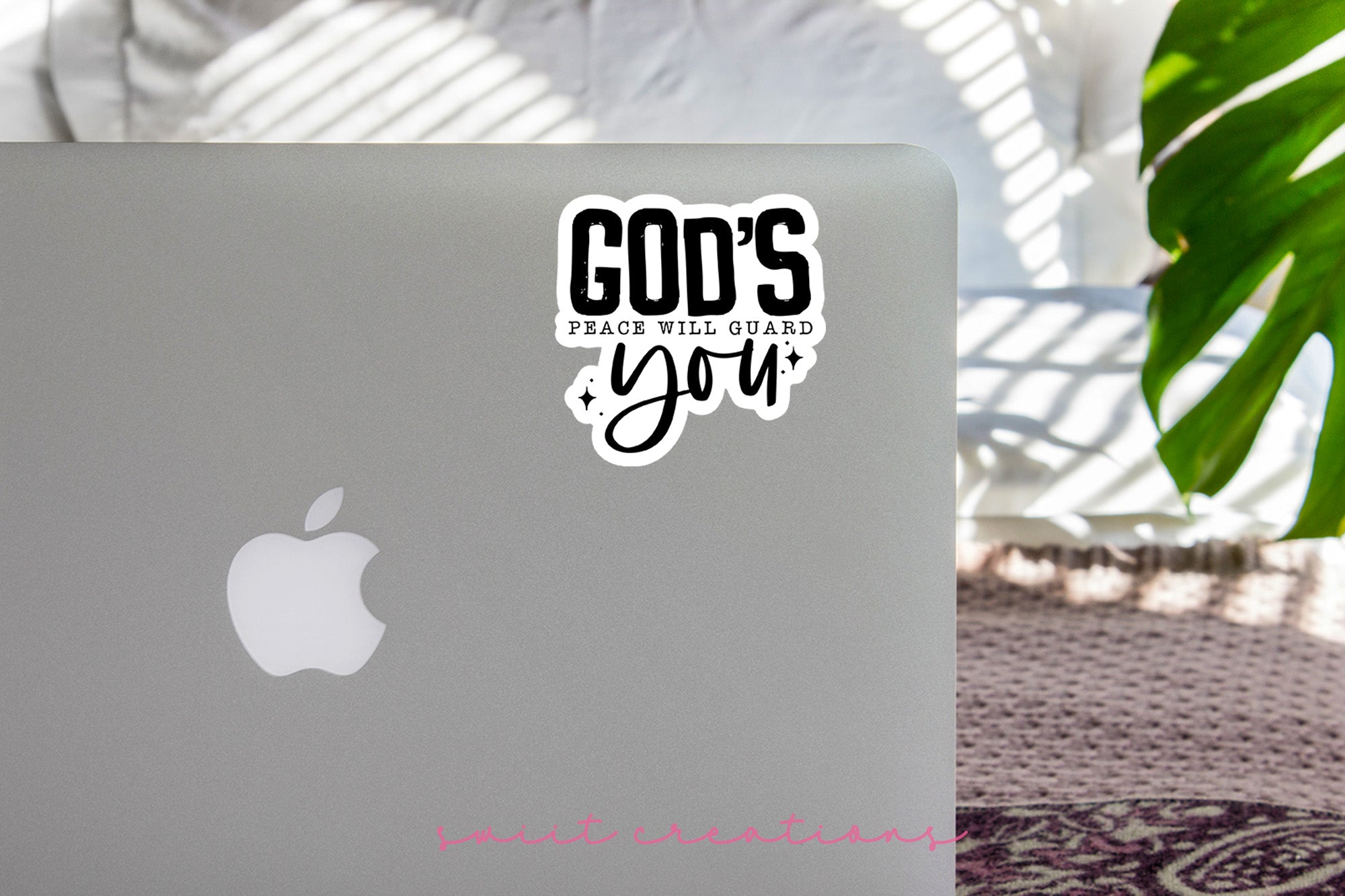 a laptop computer sitting on top of a table