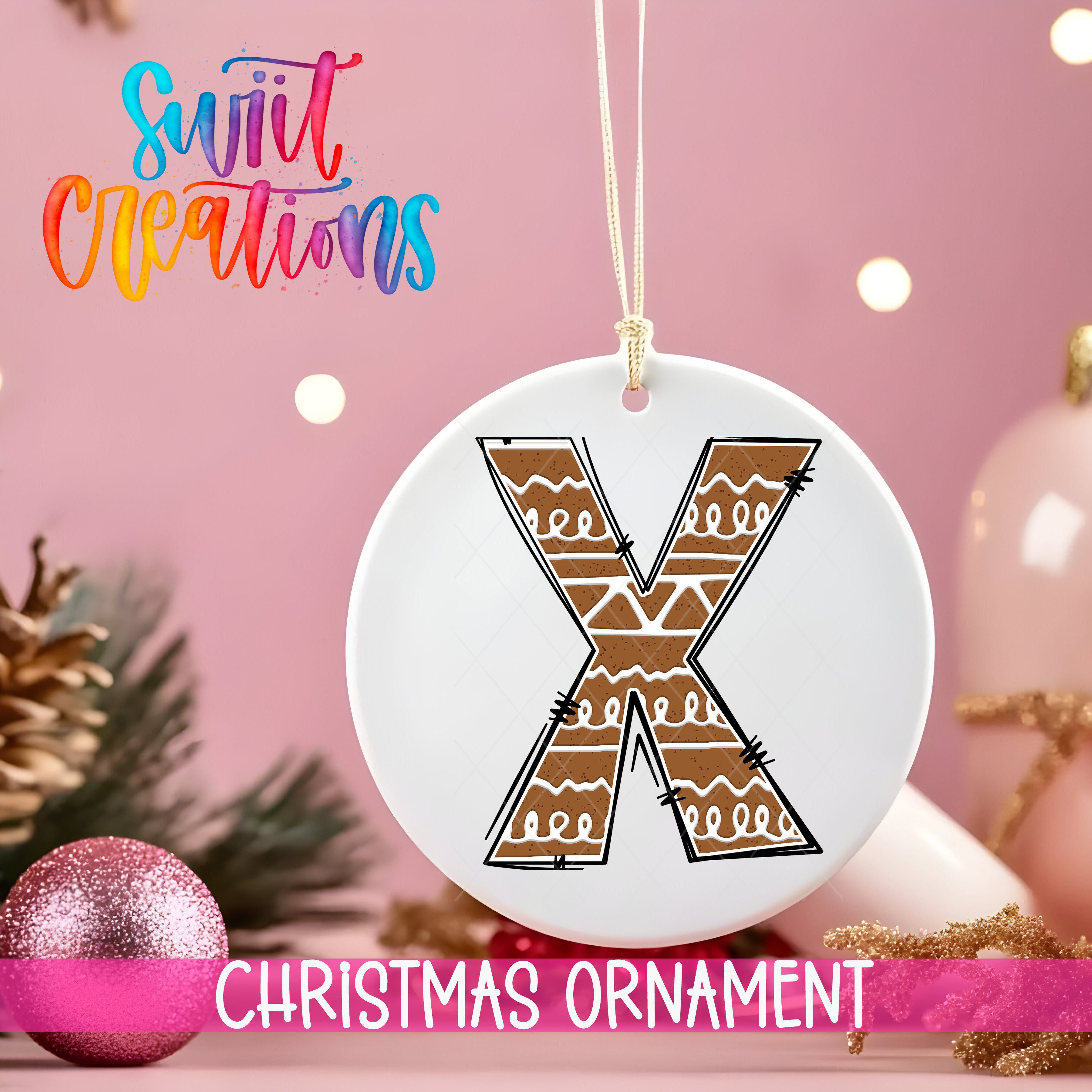 A white Christmas ornament with a brown X design hangs against a pink background, surrounded by Christmas decorations and a pink glitter ball.