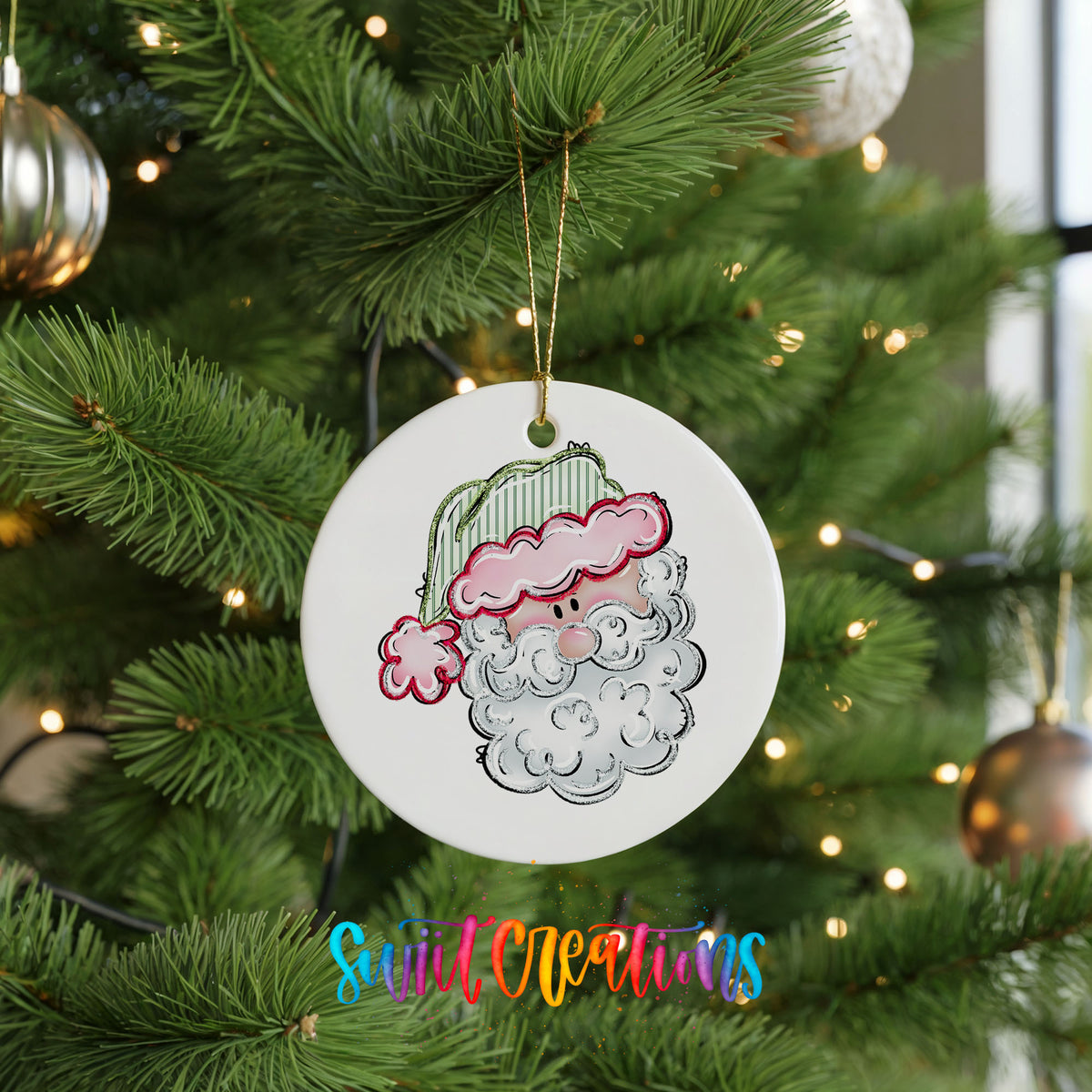 A white ceramic ornament with a Santa Claus face is hanging on a Christmas tree, surrounded by ornaments and twinkling lights.