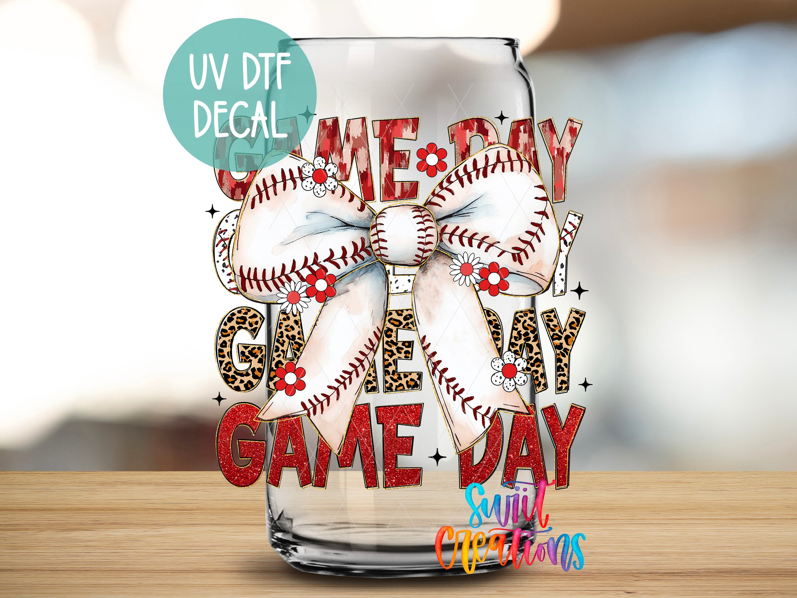 a glass with a baseball themed bow on it