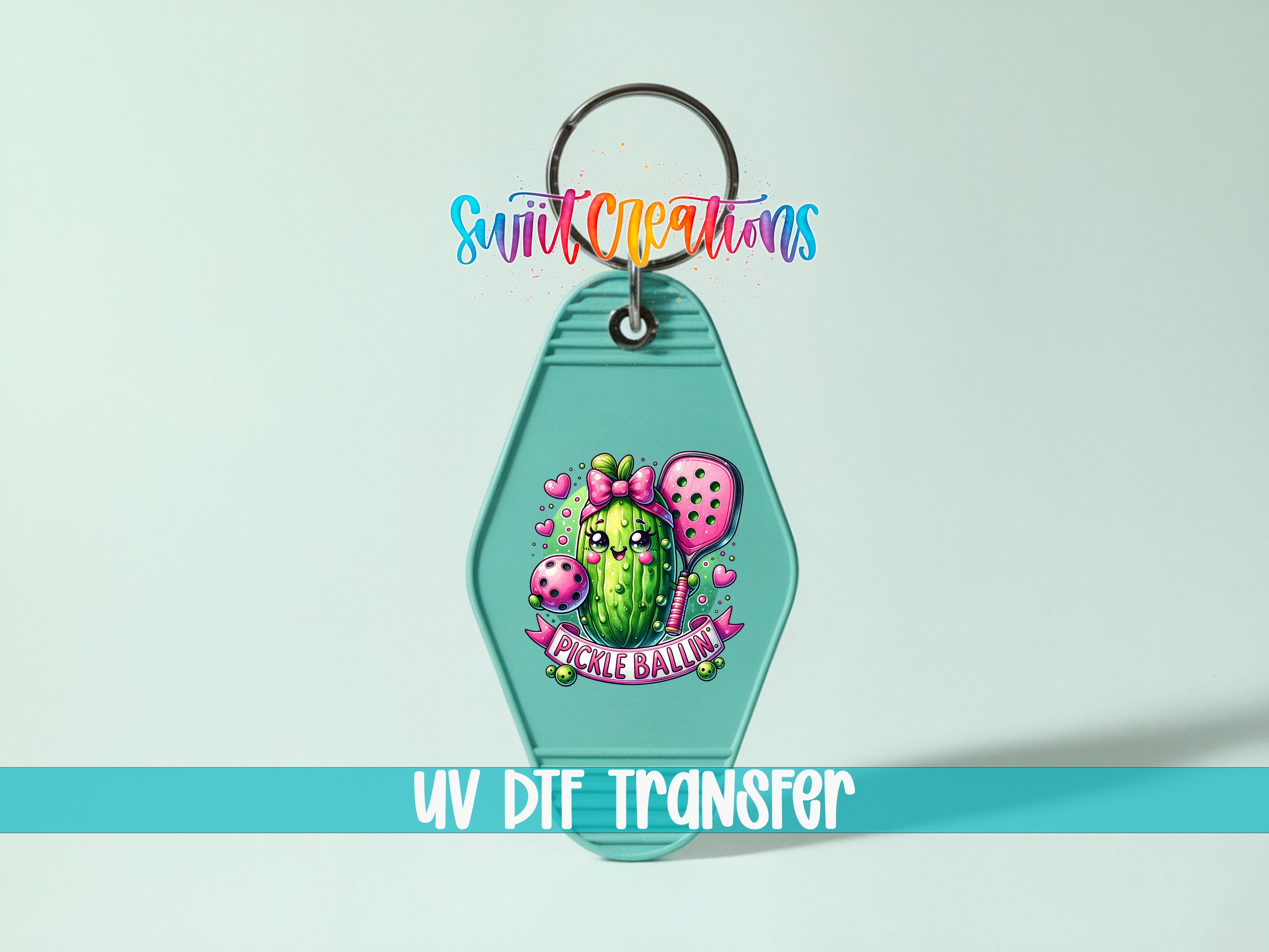 A keychain with a colorful design featuring a cartoon cactus character and the text "Pickle Ballin'".