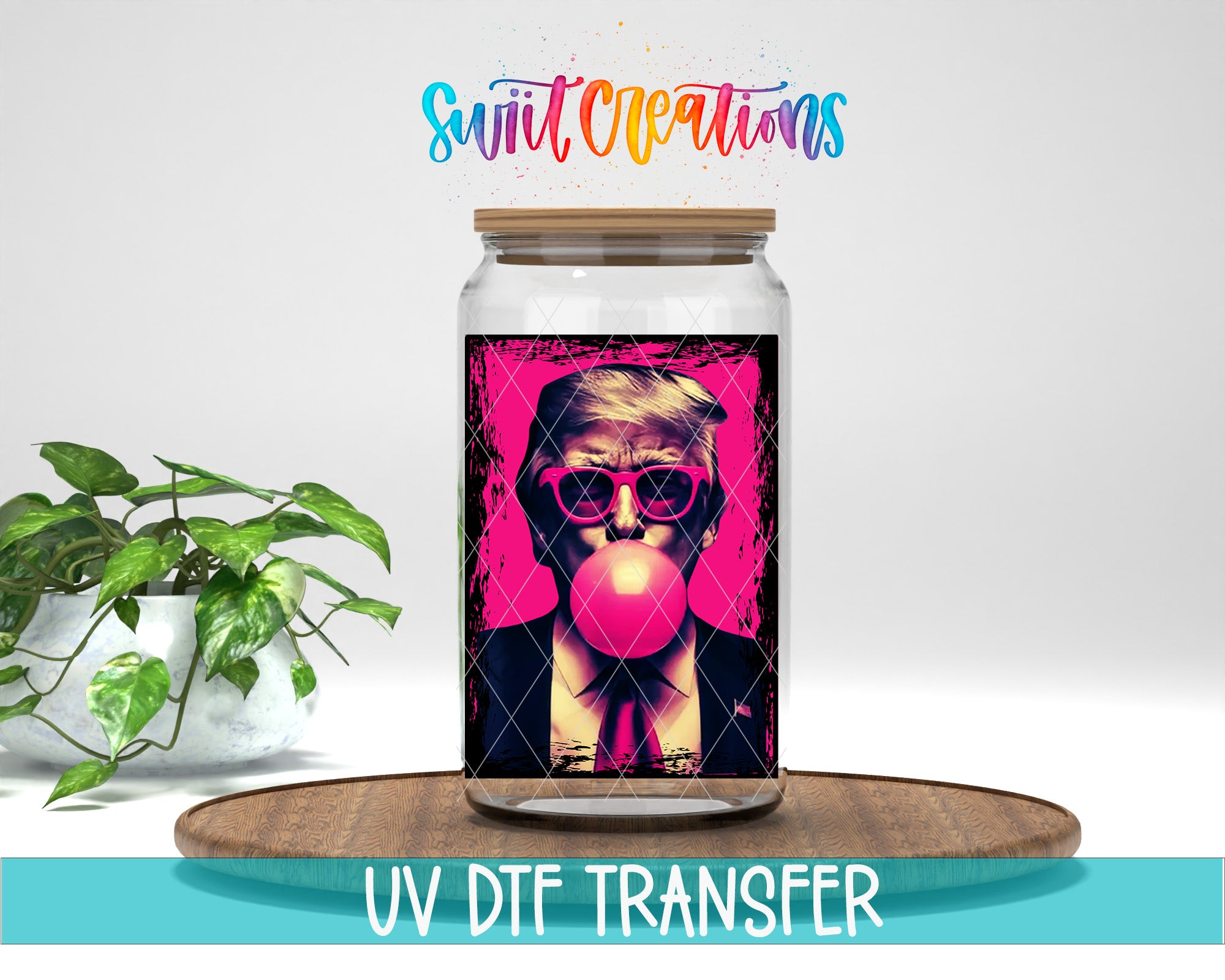 a glass jar with a colorful graphic of a person blowing a bubble gum bubble, placed on a wooden surface.