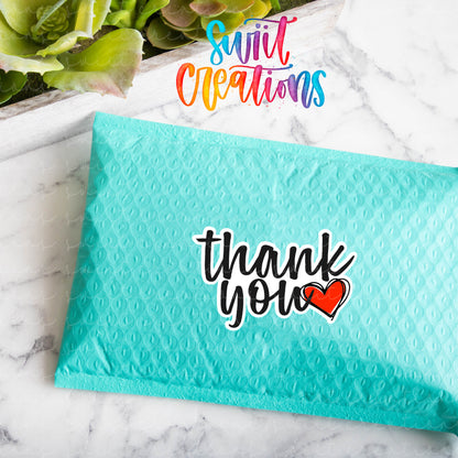 a thank you note sitting on top of a table