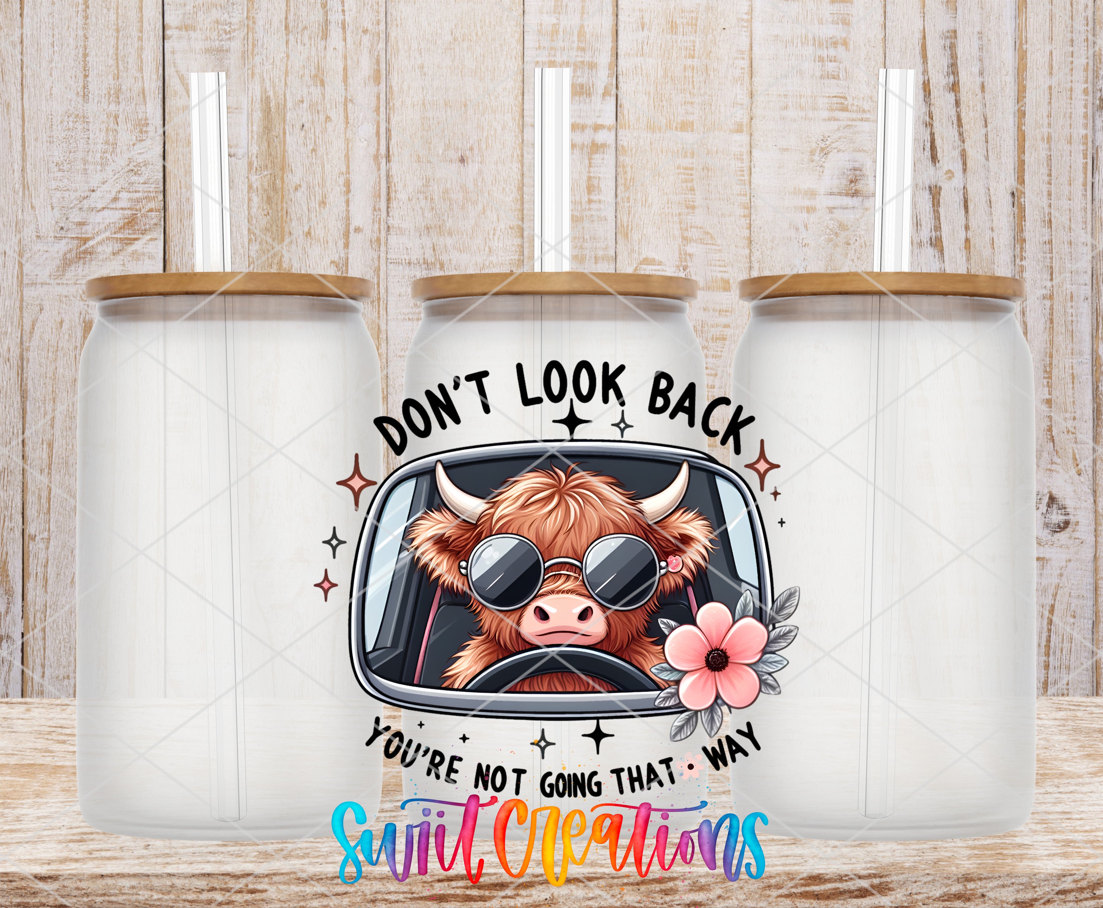 a cartoon cow wearing sunglasses and driving a car, with the text "DON'T LOOK BACK YOU'RE NOT GOING THAT WAY" displayed prominently.