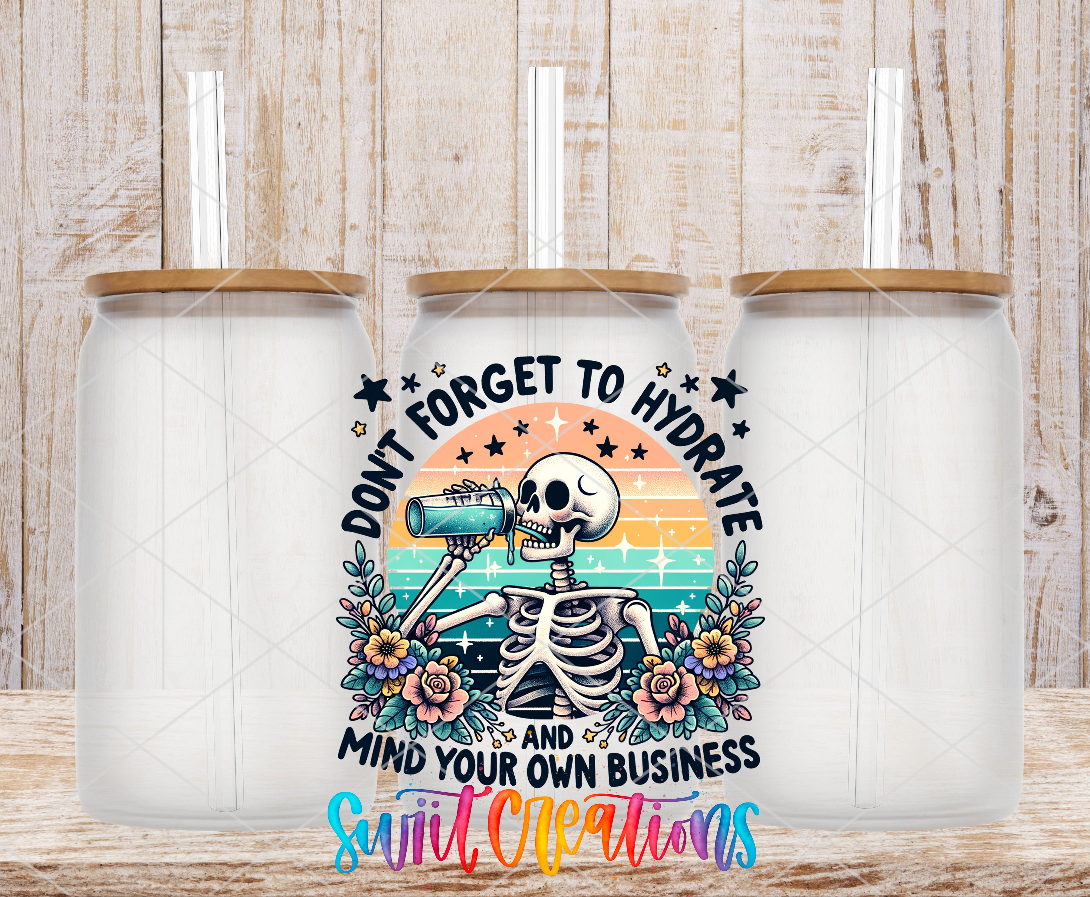 a skeleton drinking from a cup with a colorful, artistic design.