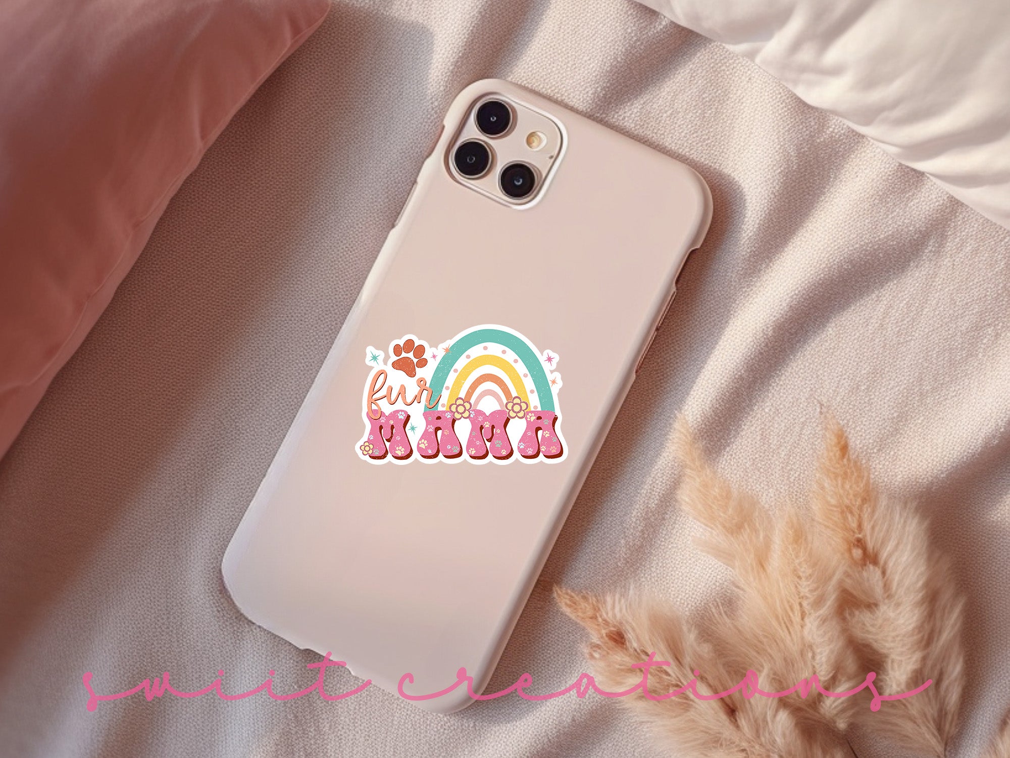 a phone case with a rainbow sticker on it