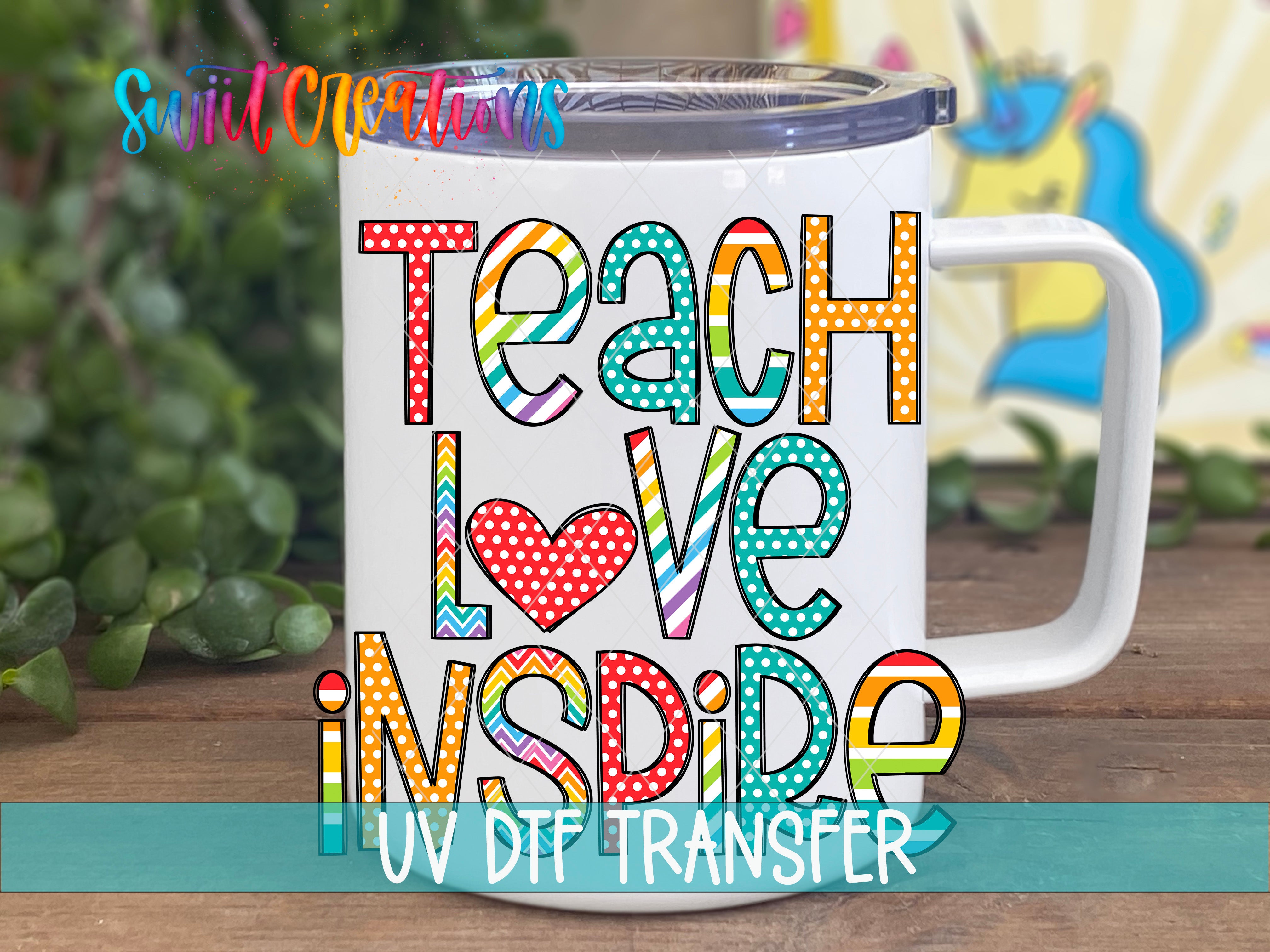 A white mug with colorful text that says "Teach Love Inside" and "UV DIF TRANSFER" printed on it.