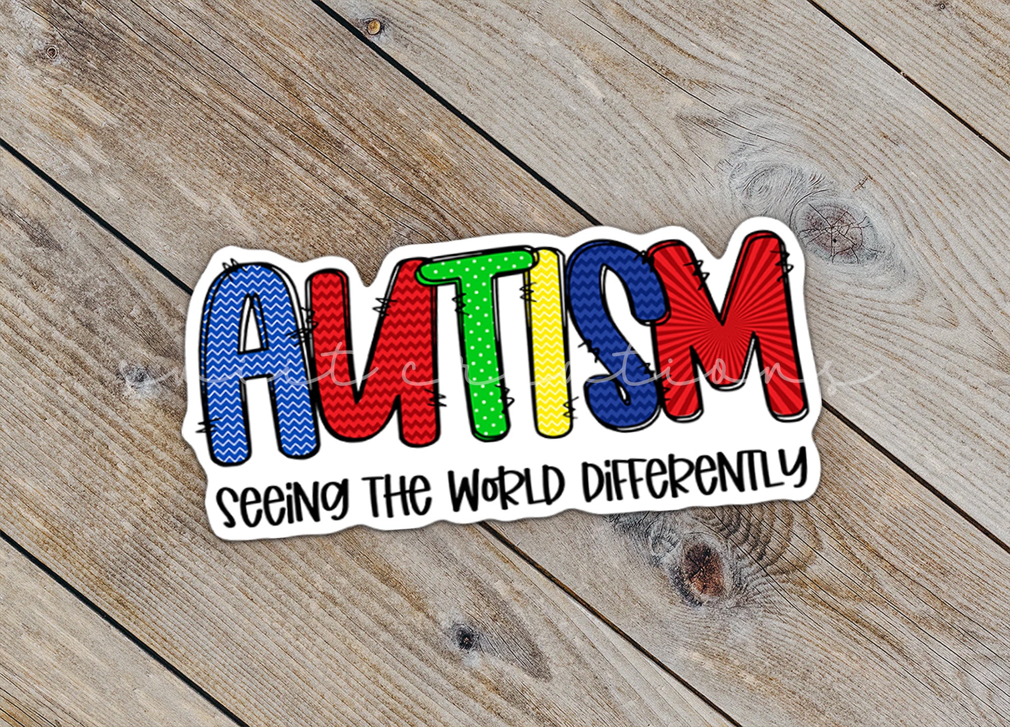 a sticker with the word autism on it