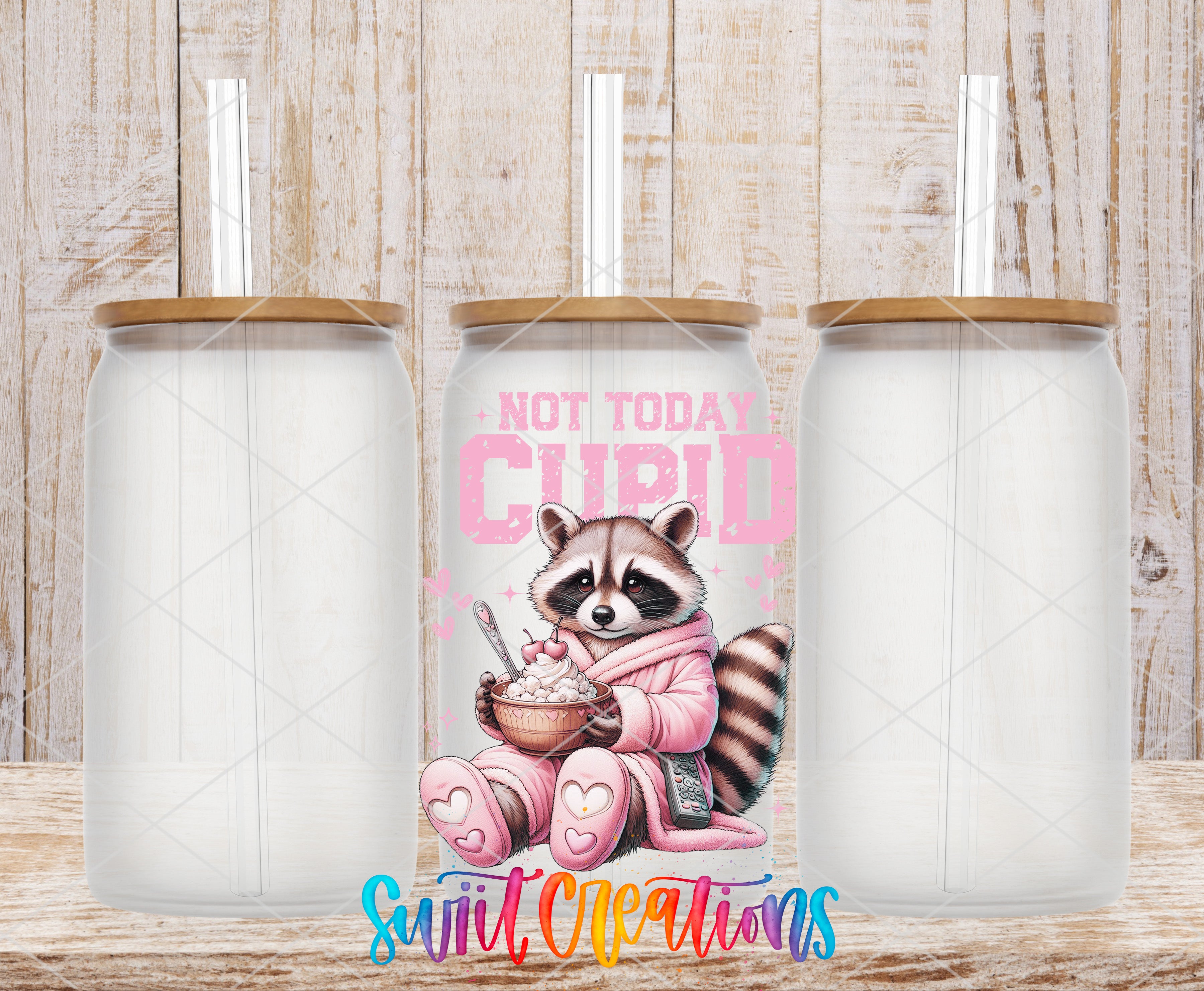 A can with a raccoon wearing a pink outfit and holding a bowl of food, accompanied by the text "NOT TODAY CUPID" and "Sweet Creations" in the background.