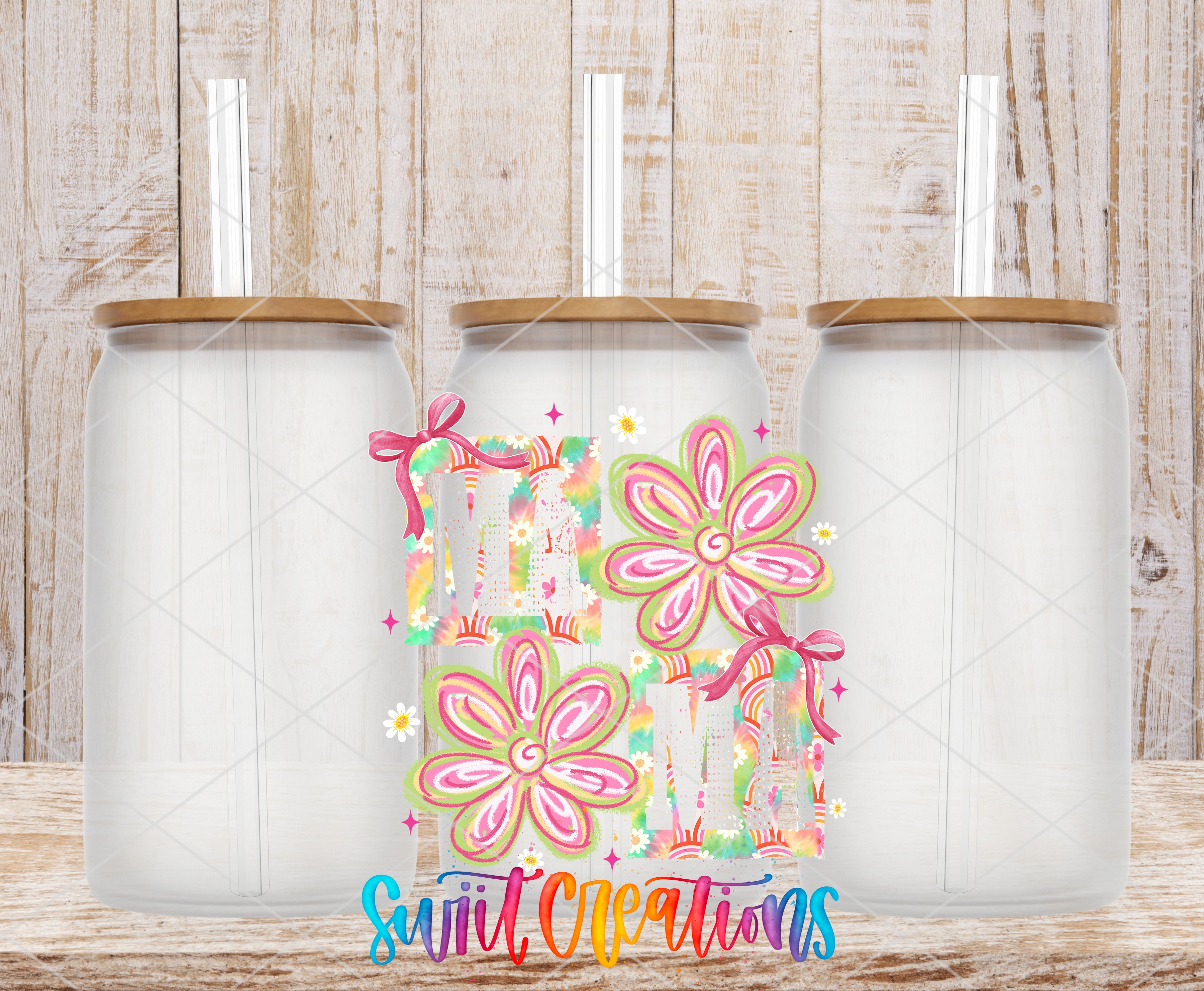 three glass jars with lids, each containing a straw, arranged in a row against a wooden background.