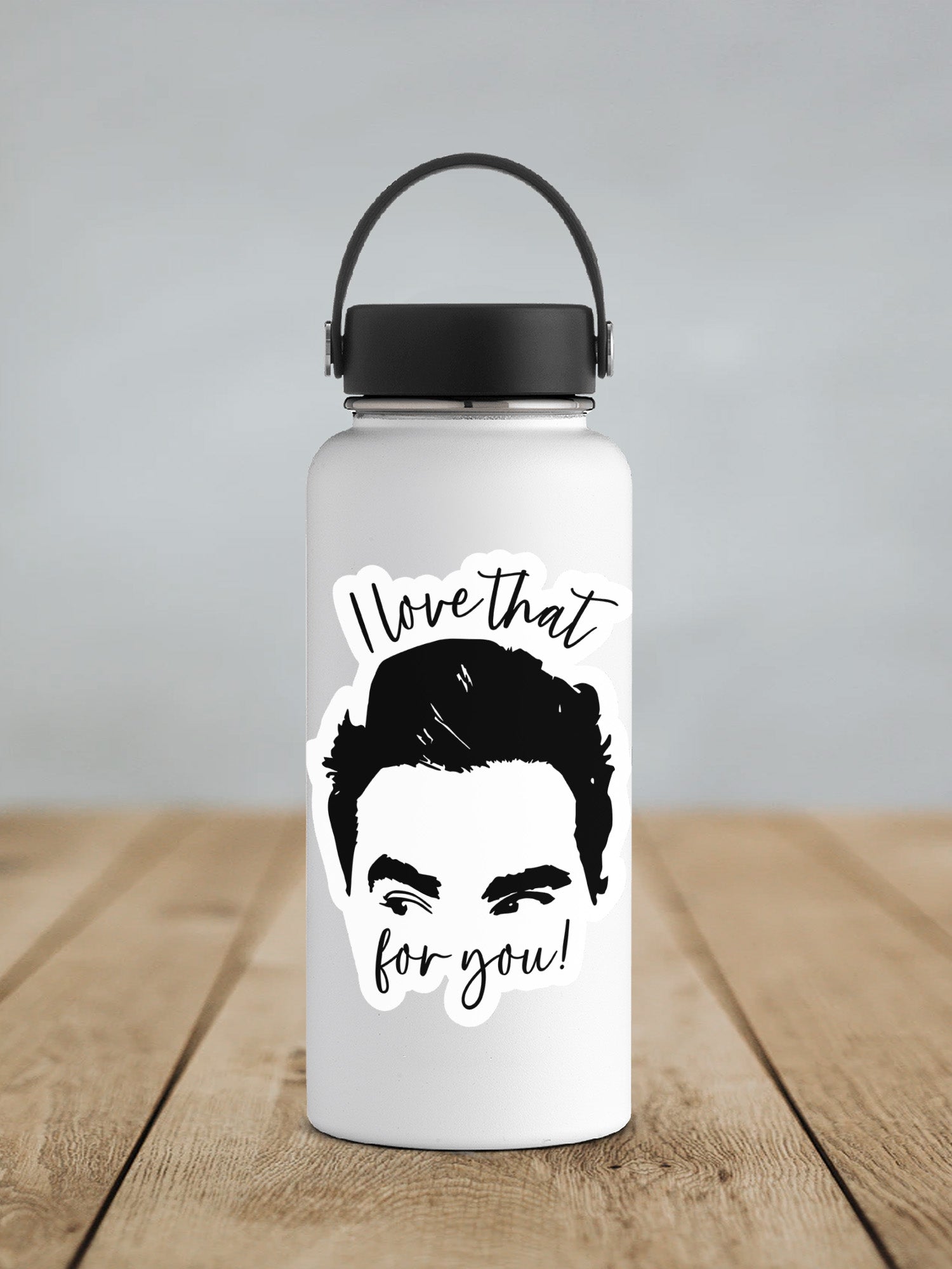 a water bottle with a picture of a man's face on it