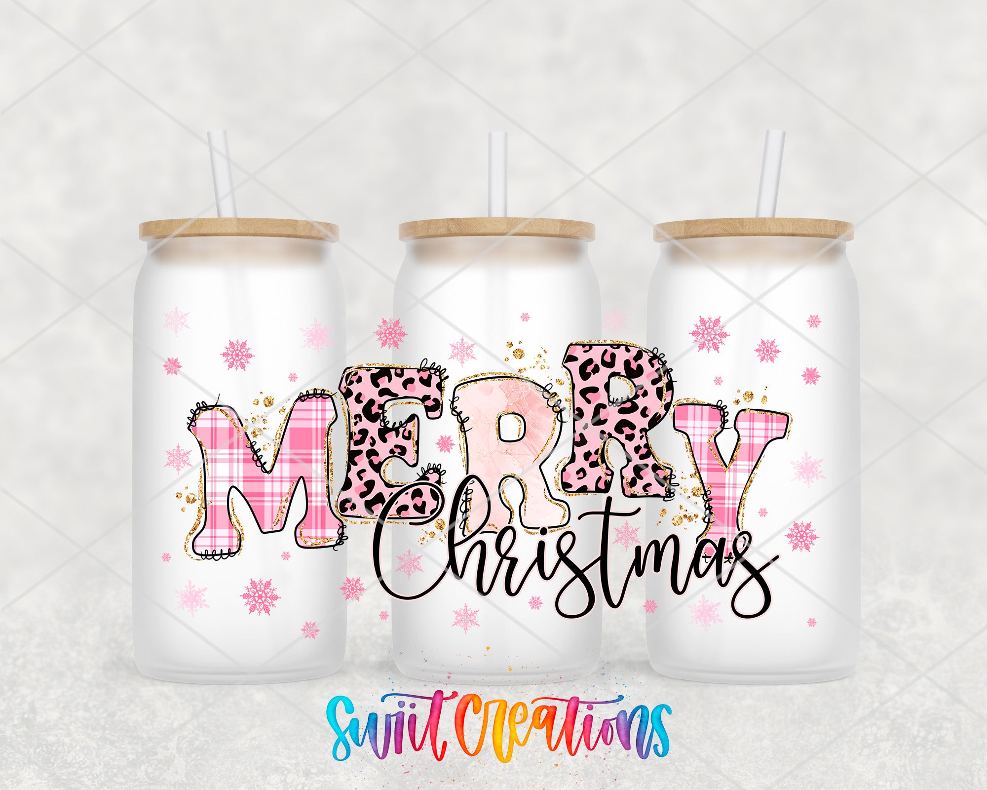 three frosted glass tumblers with the text "MERRY CHRISTMAS" written on them in a stylized, colorful font.