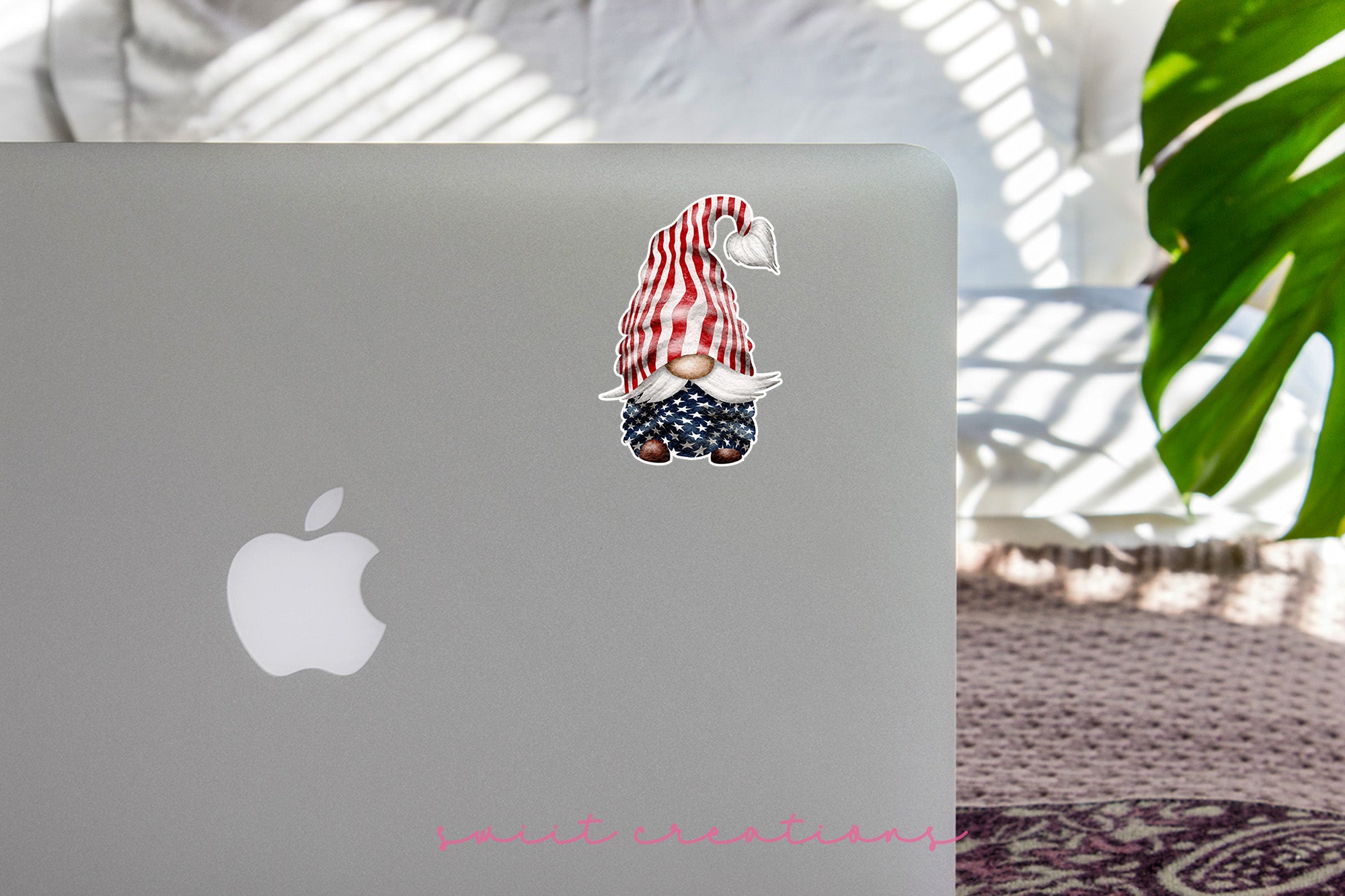 a laptop with a sticker of a dog on it