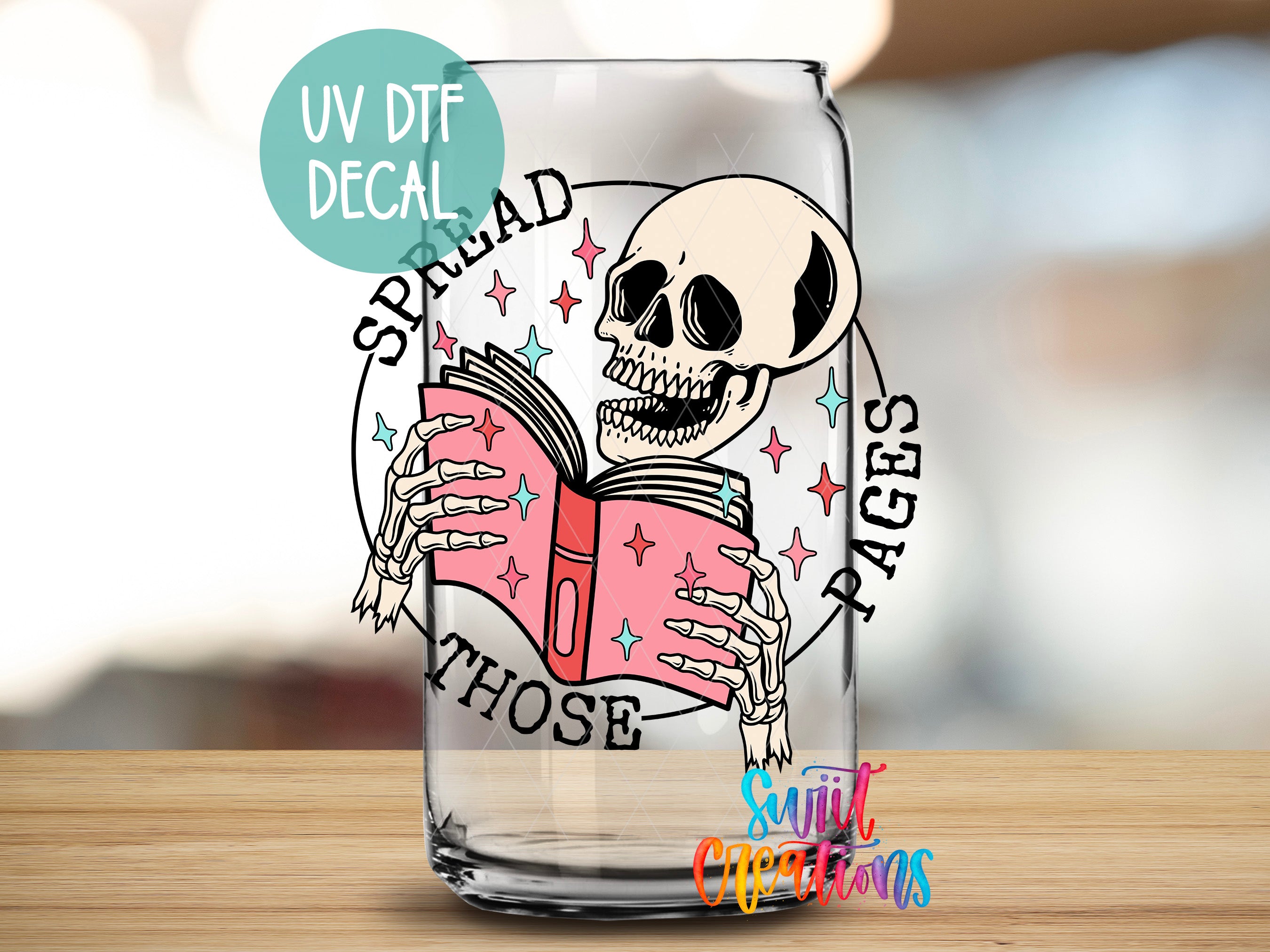 a glass with a skull reading a book