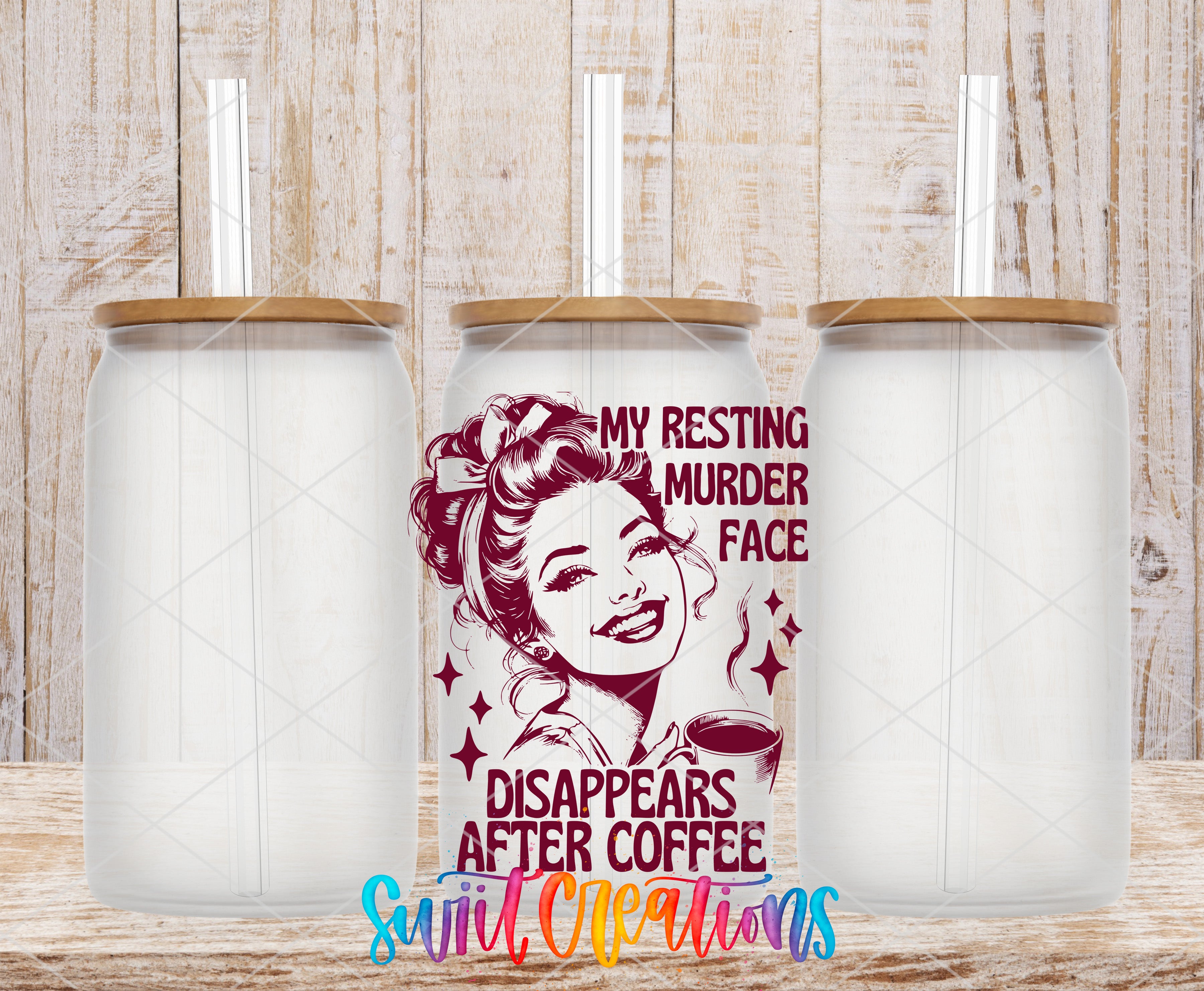 a clear glass jar with a brown lid, and there is a printed design on the jar depicting a woman with a serious expression. The design includes text that reads "My resting murder face" and "Disappears after coffee".
