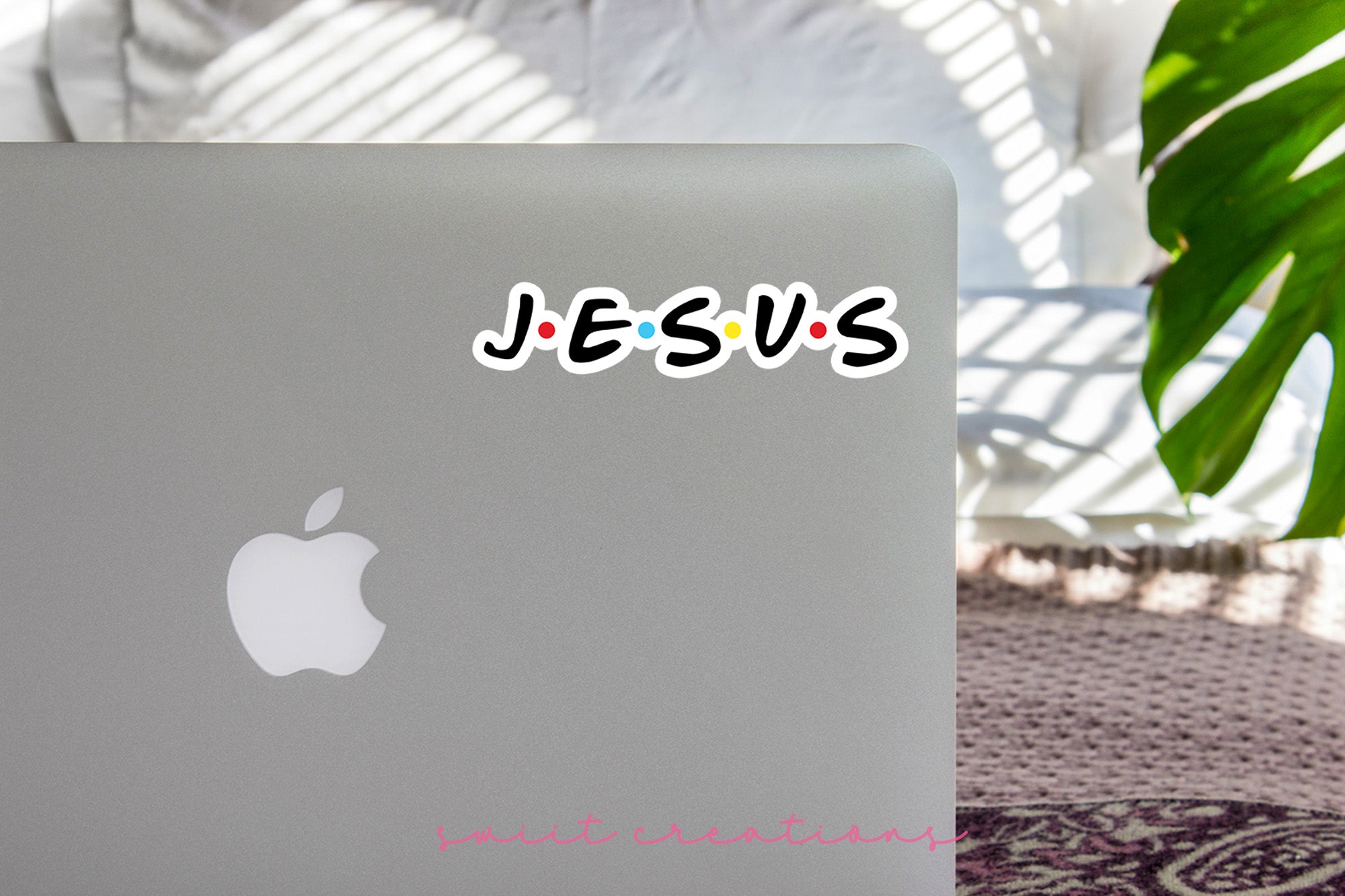 a laptop computer sitting on top of a table