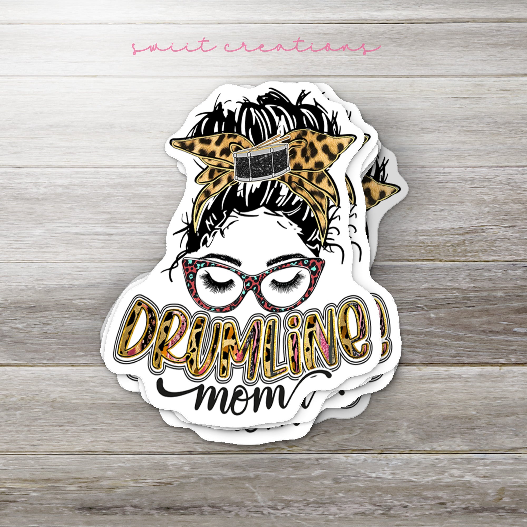 a sticker of a woman with glasses and a leopard print on her head