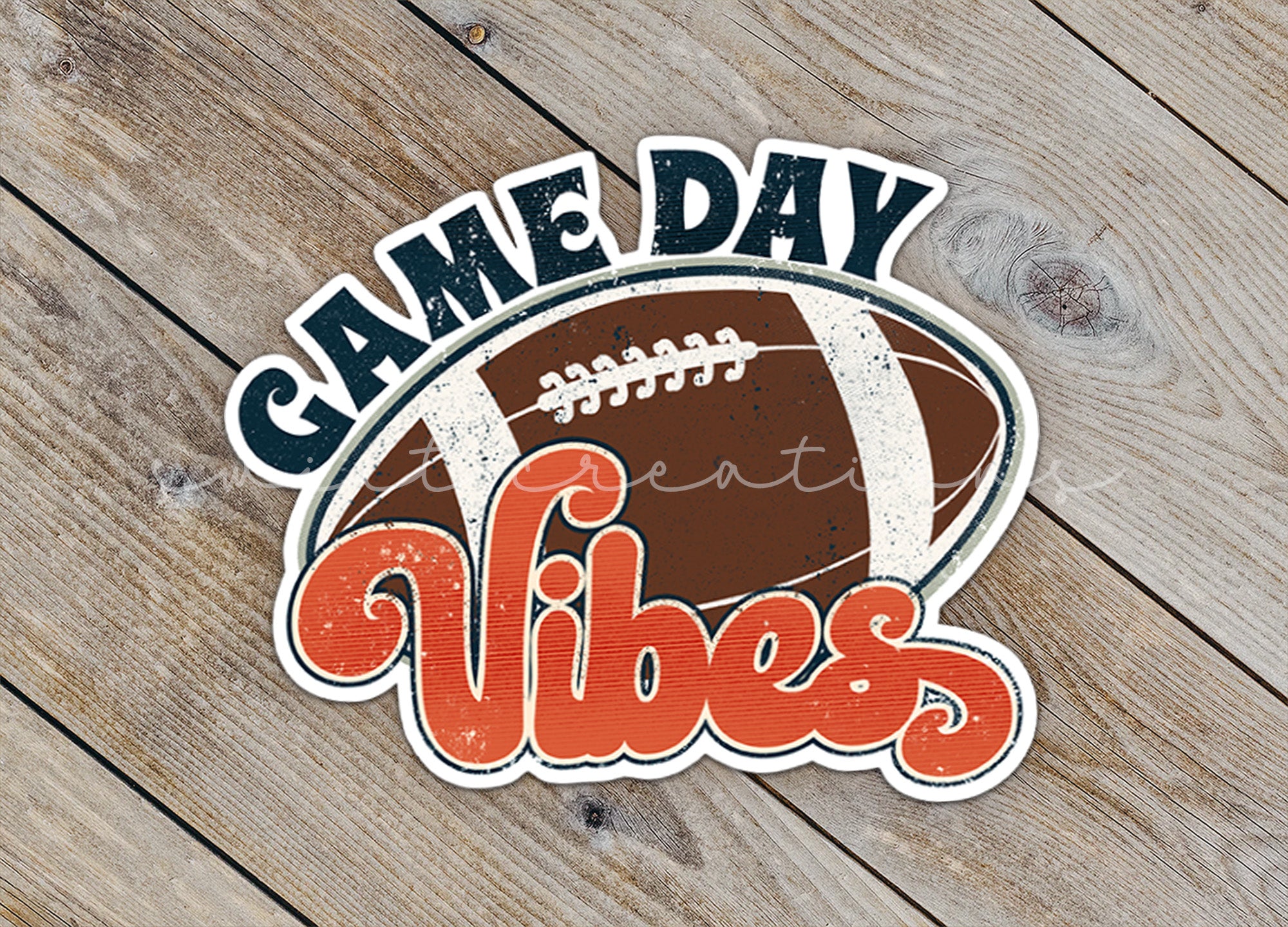 a sticker that says game day vibes with a football on it
