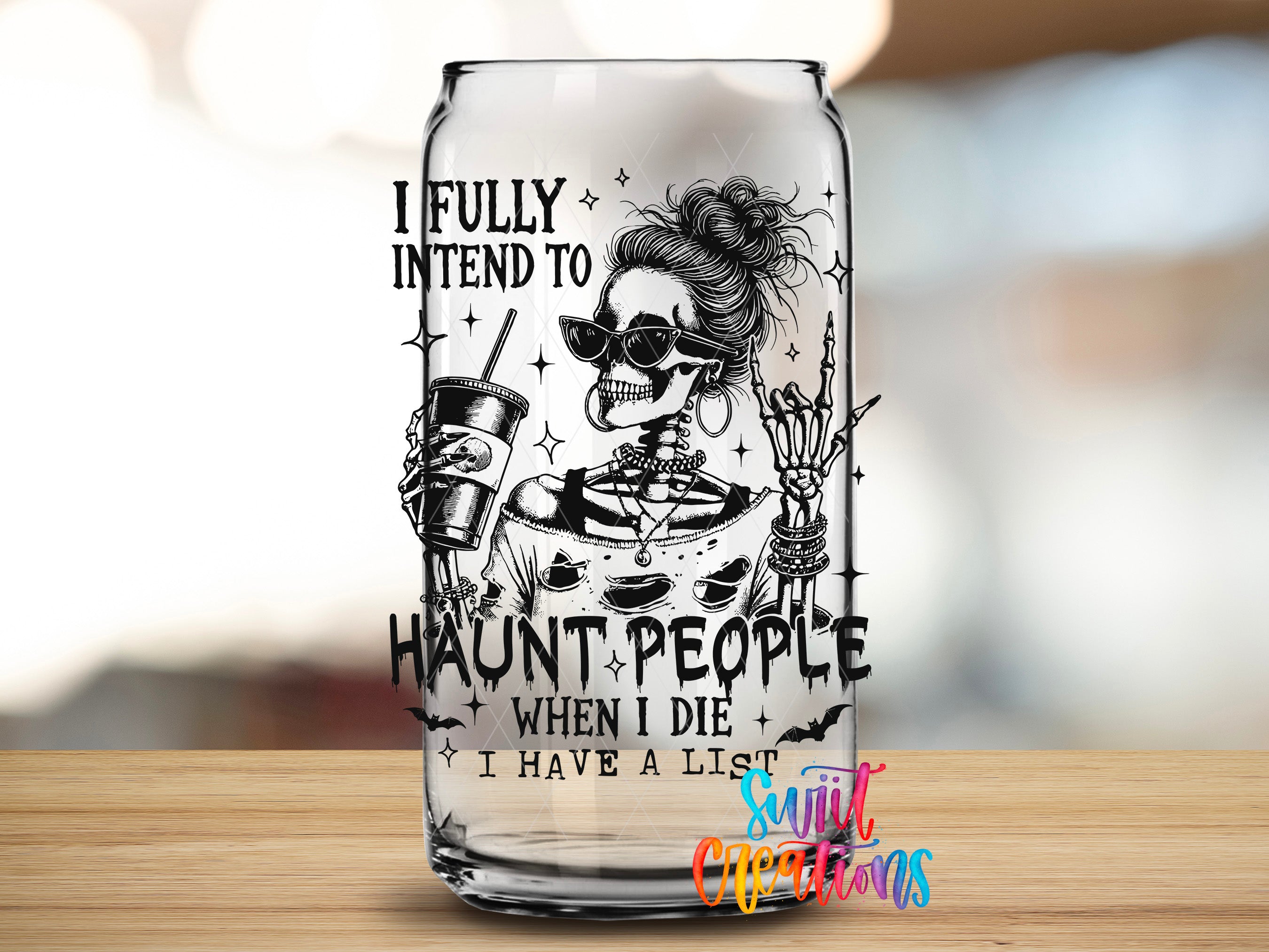 A glass can with a skeleton wearing sunglasses and holding a drink, along with text that says "I Fully intend to Haunt people when I die, I have a list".