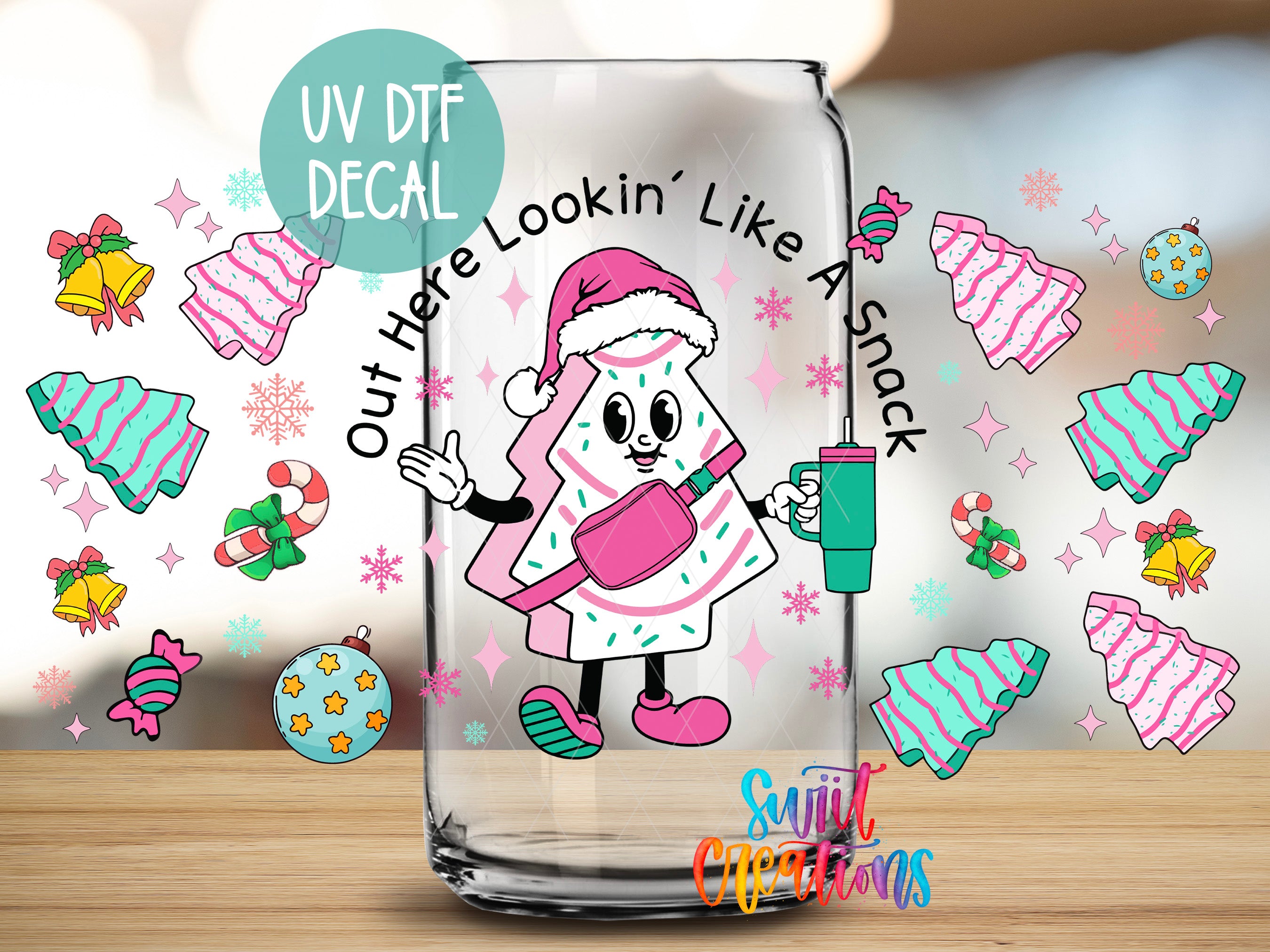 a glass jar with a cartoon character on it, surrounded by various Christmas-themed decorations such as snowflakes, ornaments, and a Christmas tree.
