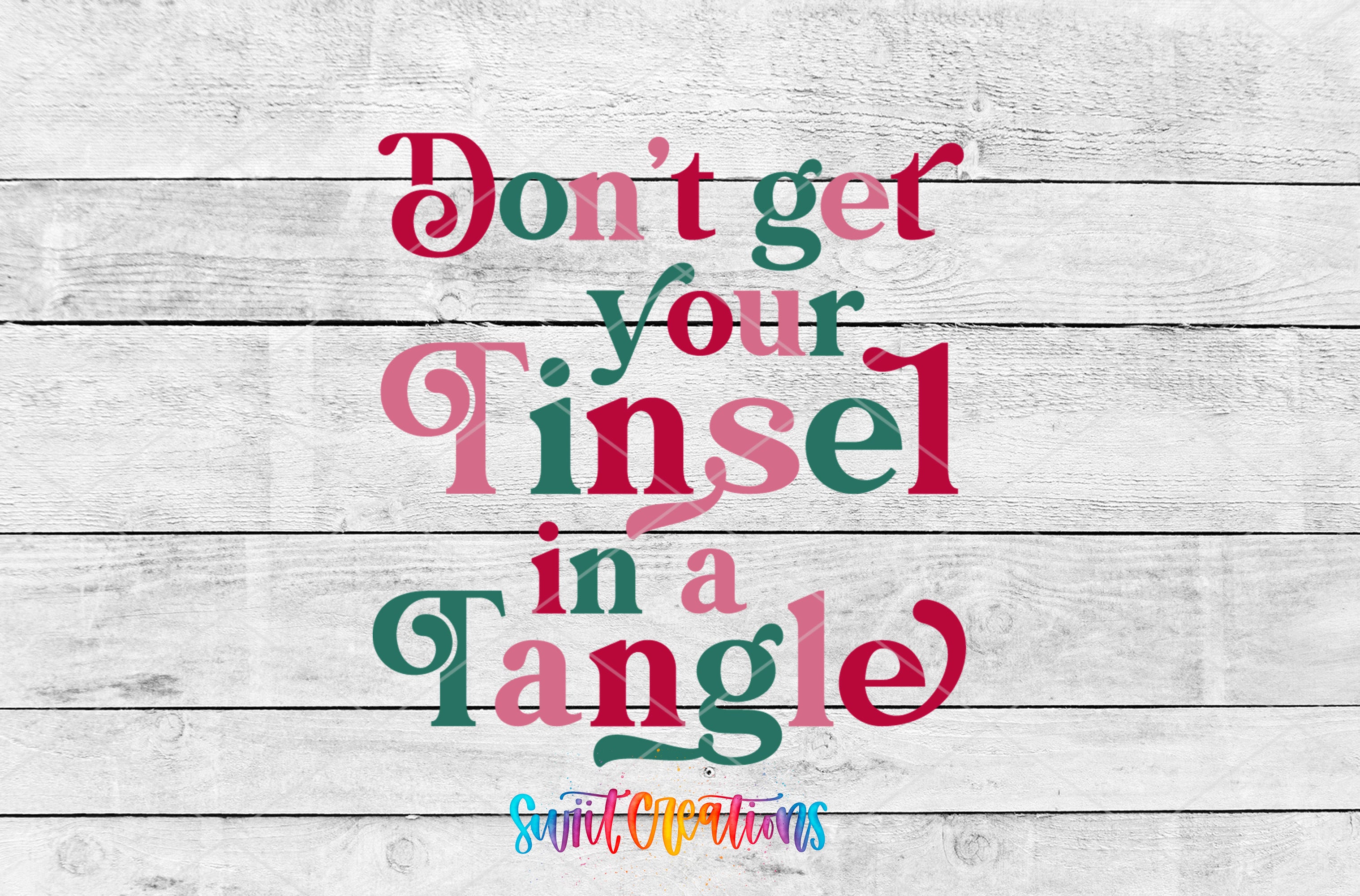 a colorful text that reads "Don't get your tinsel in a tangle" in a playful and whimsical font.