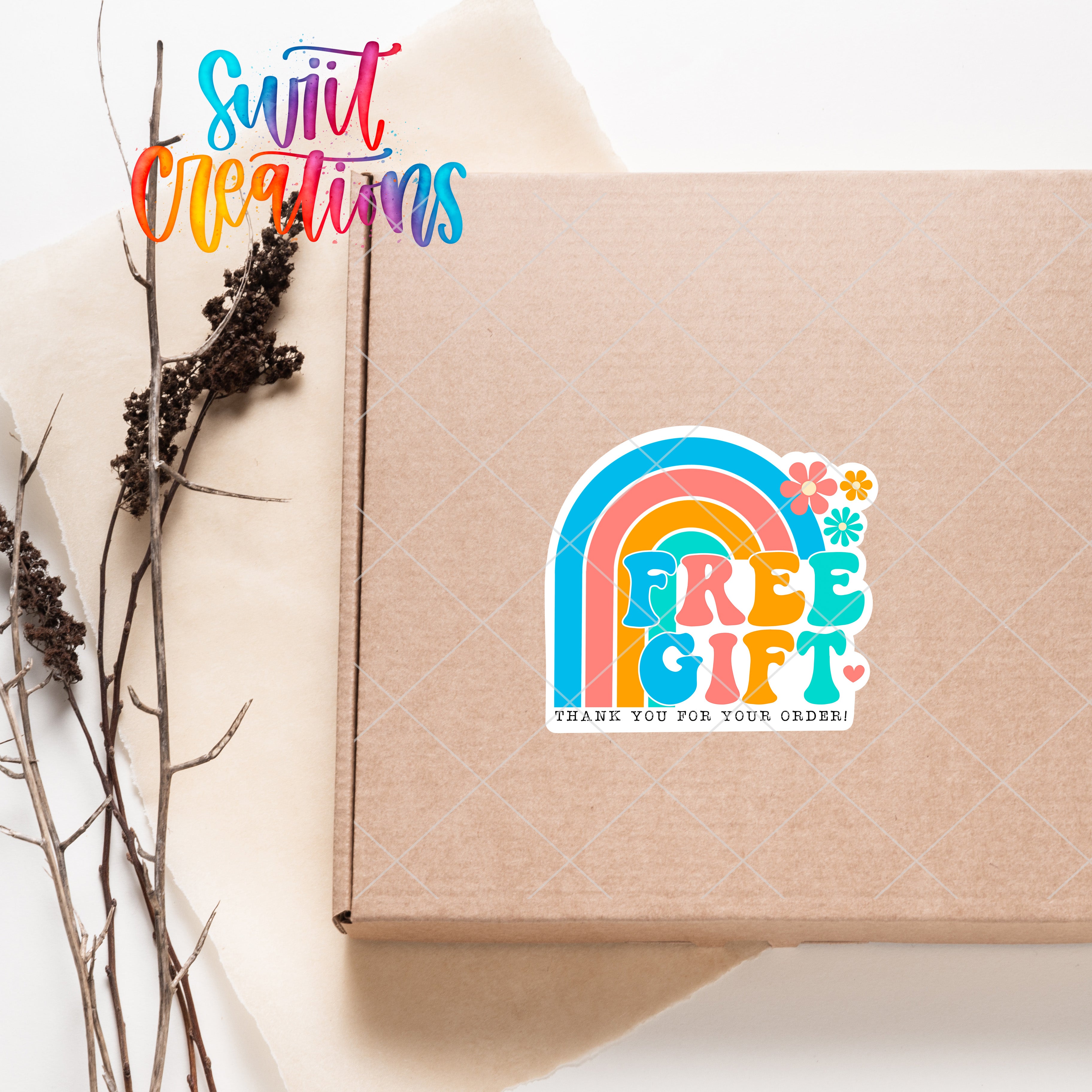 a box with a rainbow sticker on it