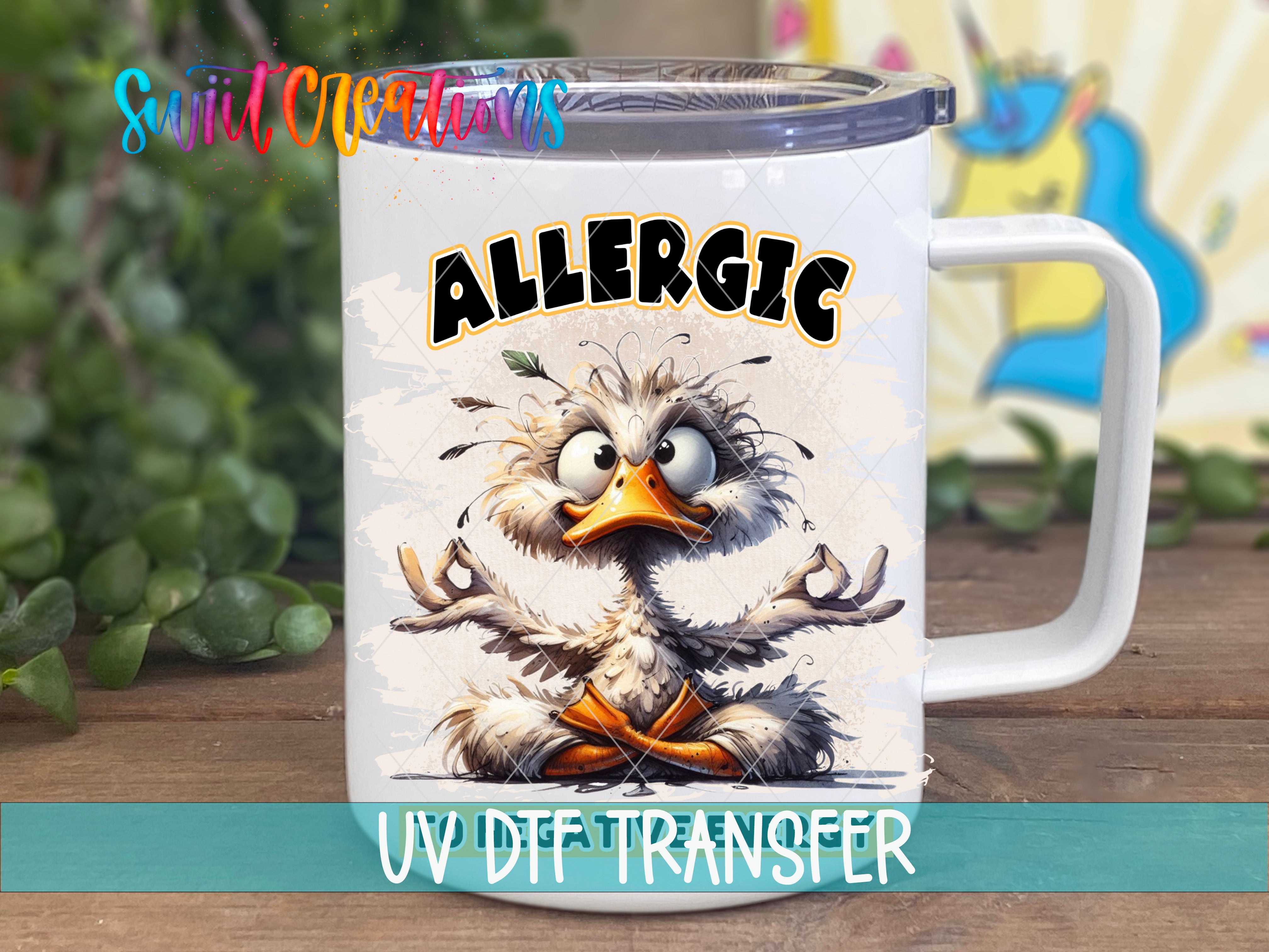 A mug with a cartoon duck and the word "ALLERGIC" printed on it.