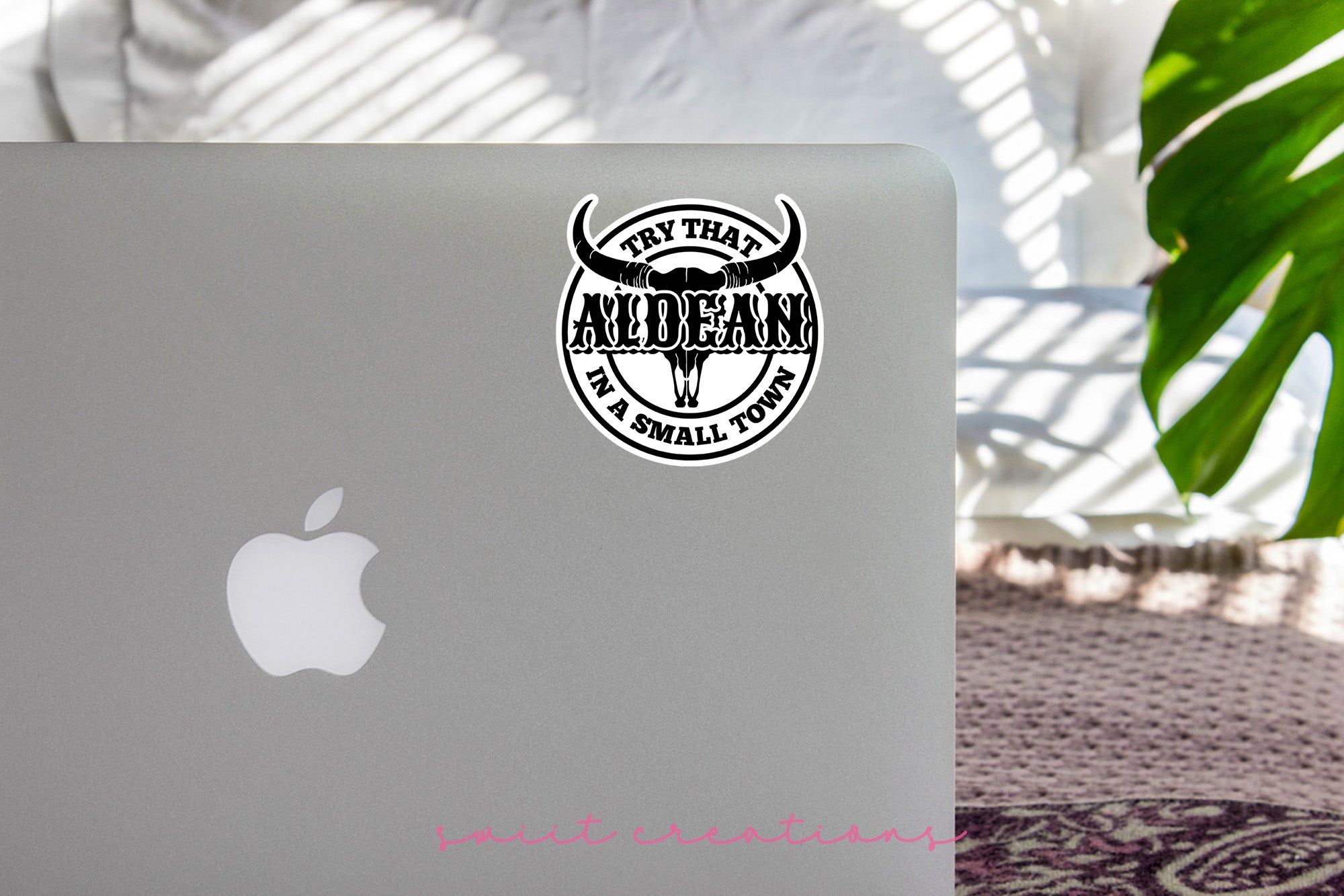 a laptop computer sitting on top of a table