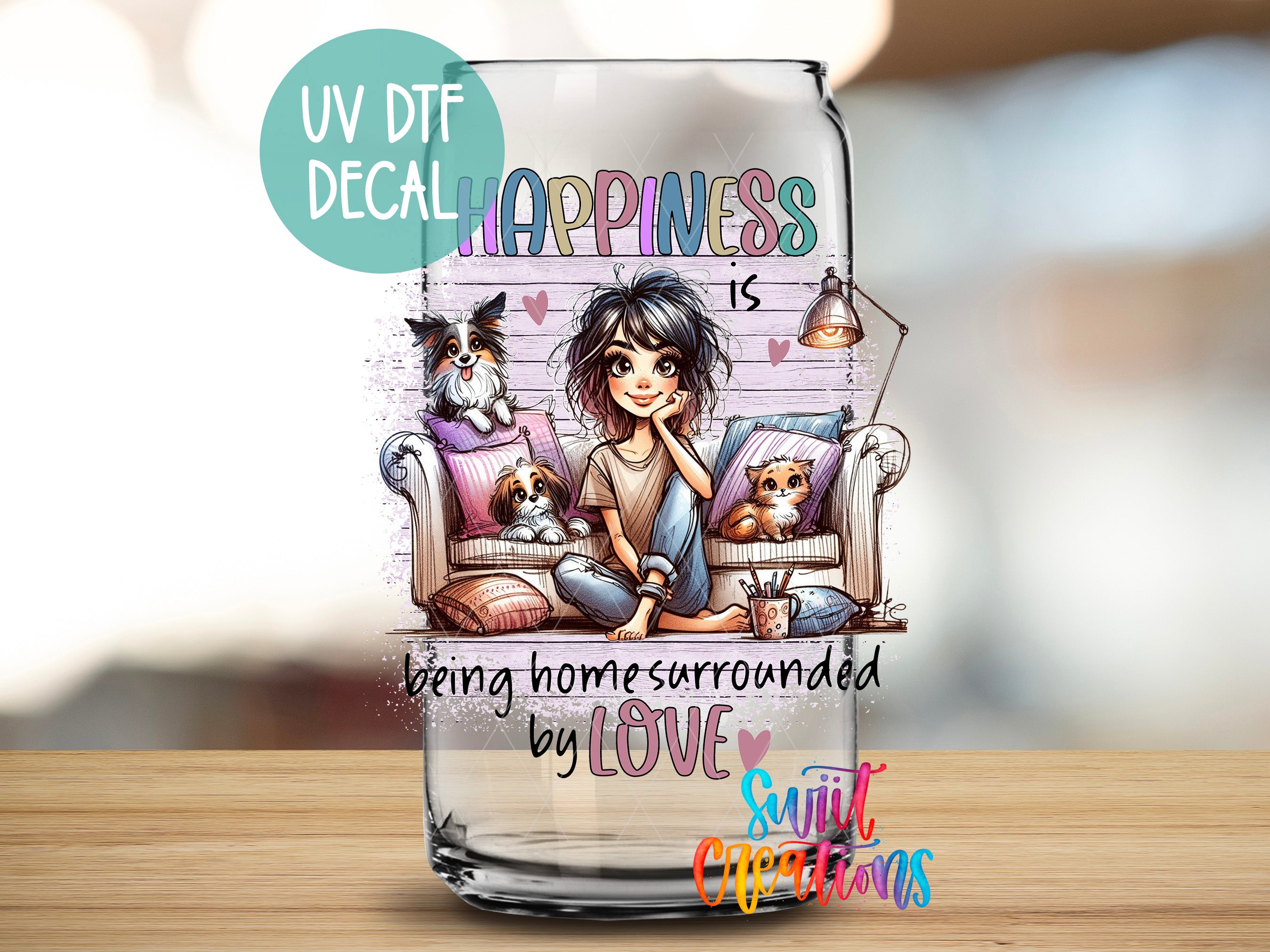a glass with a picture of a girl sitting on a couch