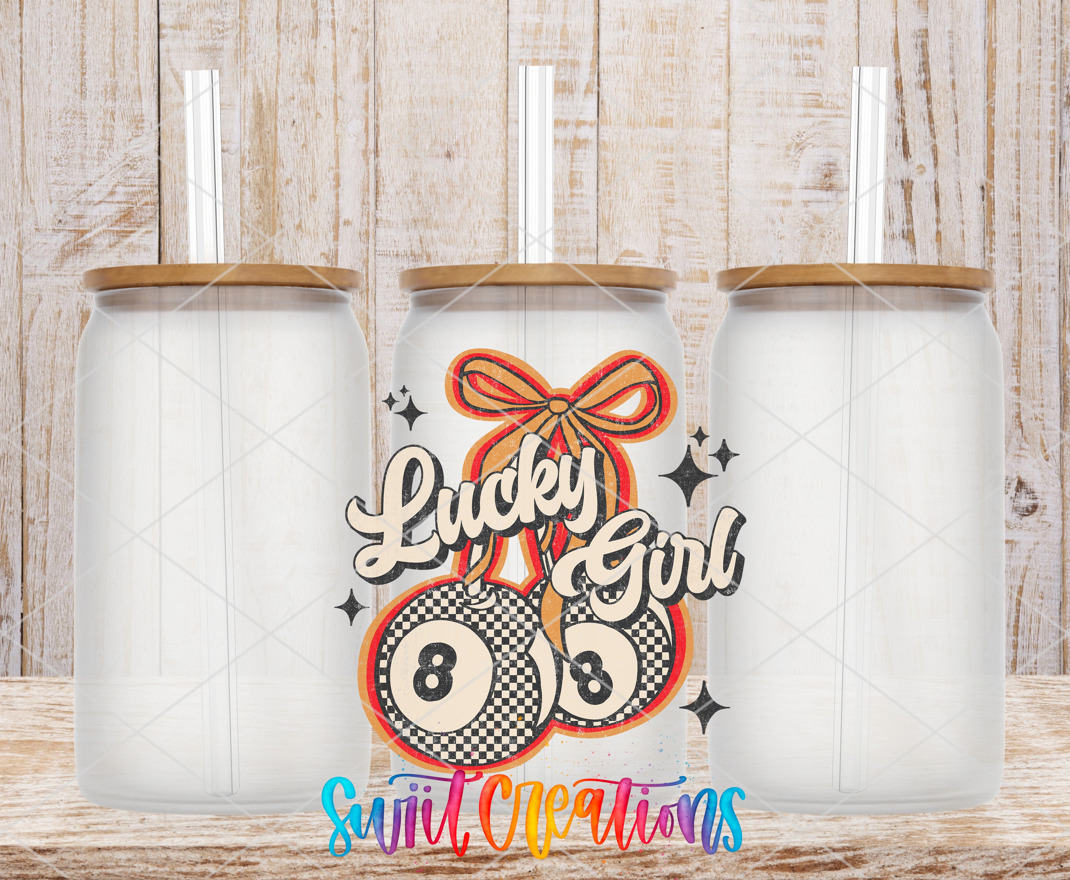 three clear glass jars with lids, each with a straw sticking out of the top. The jars are arranged in a row, and there is a colorful design on the front of each jar, including a pattern of circles and a ribbon. The text "Lucky Girl" is written in a stylized font, and the phrase "Sweet Creations" is written below the jars.