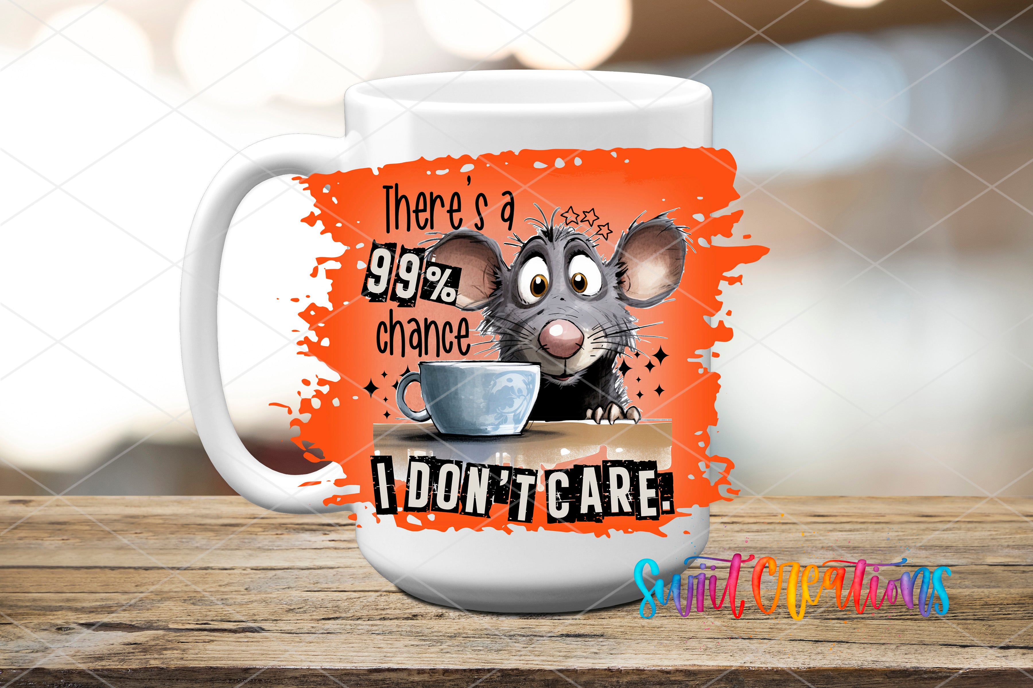 A white mug with an orange splatter design featuring a cartoon mouse and the text "There's a 99% chance I don't care"