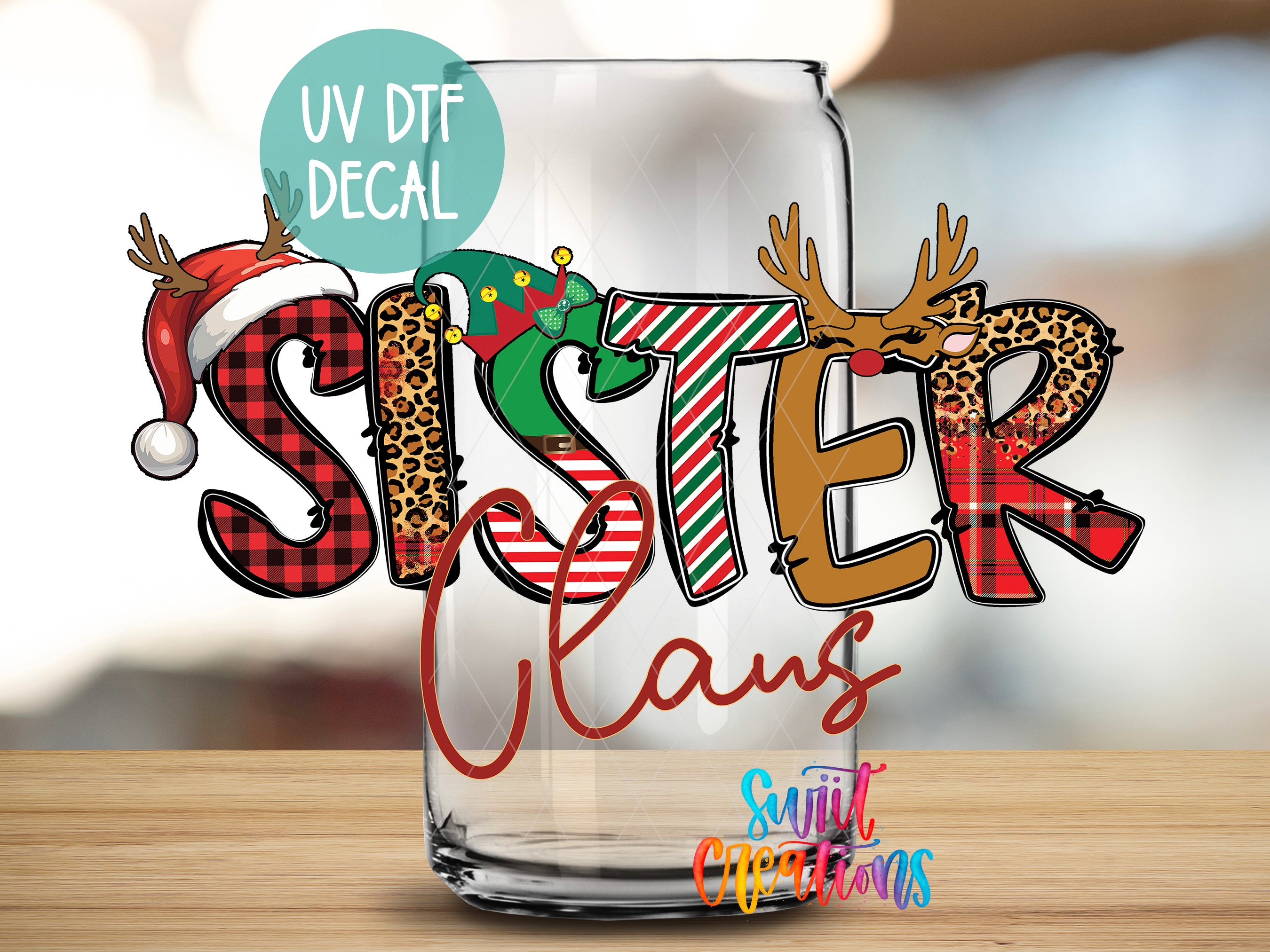 a shot glass with the word sister claus printed on it