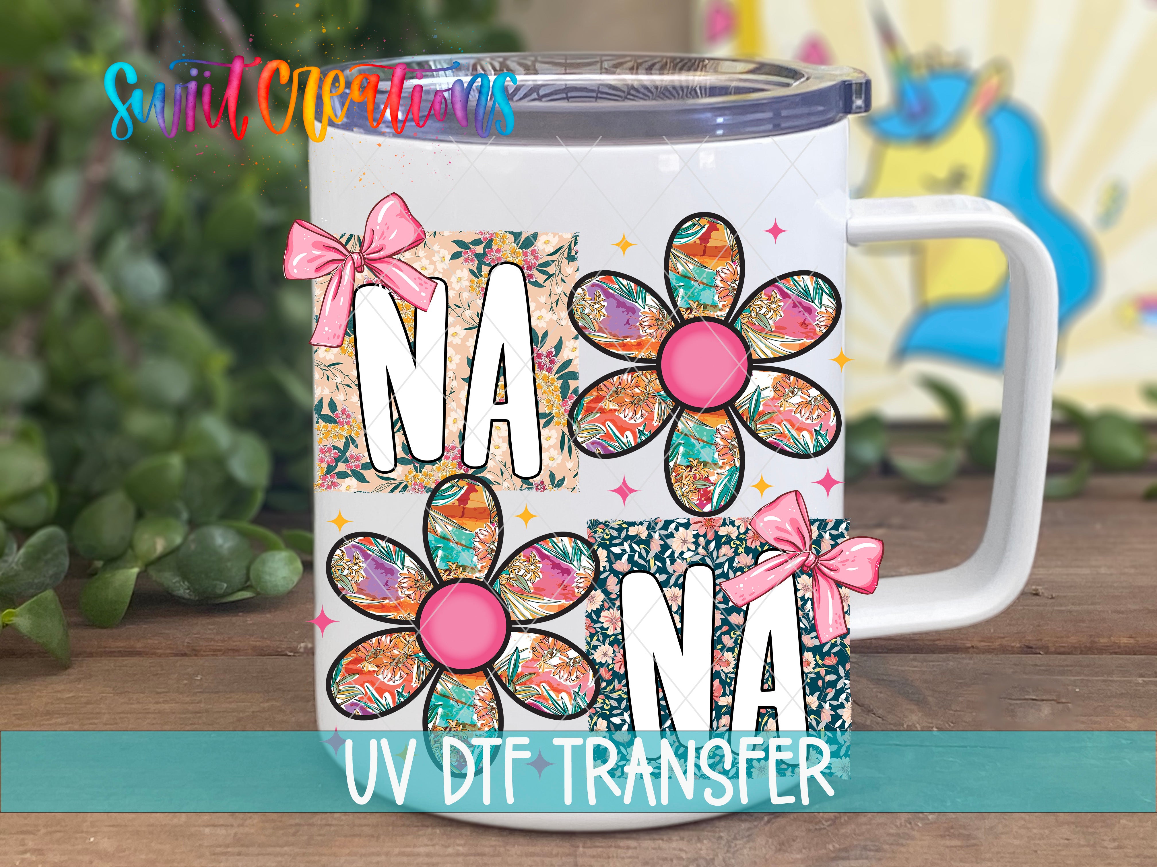A white mug with colorful floral designs and the text "NA" printed on it, along with the text "UV DFT Transfer" at the bottom.