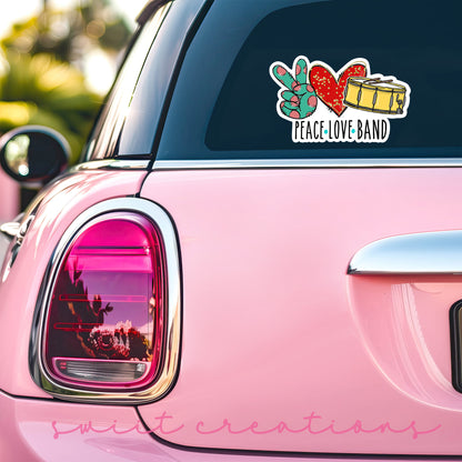 a pink car with a sticker that says true love band