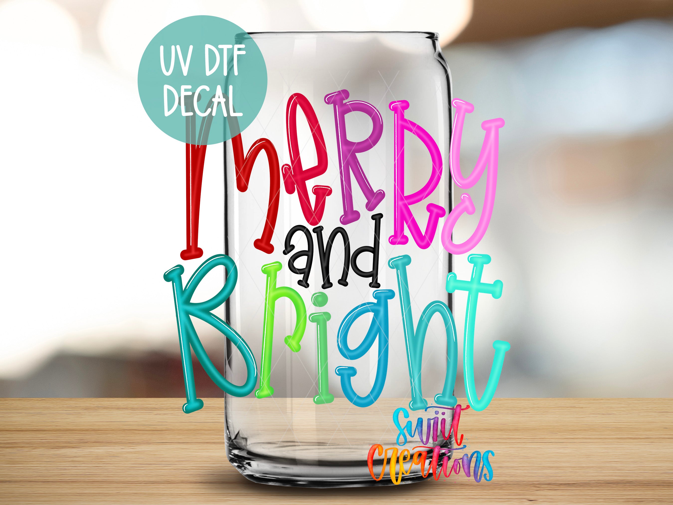 a glass with the words merry and bright painted on it