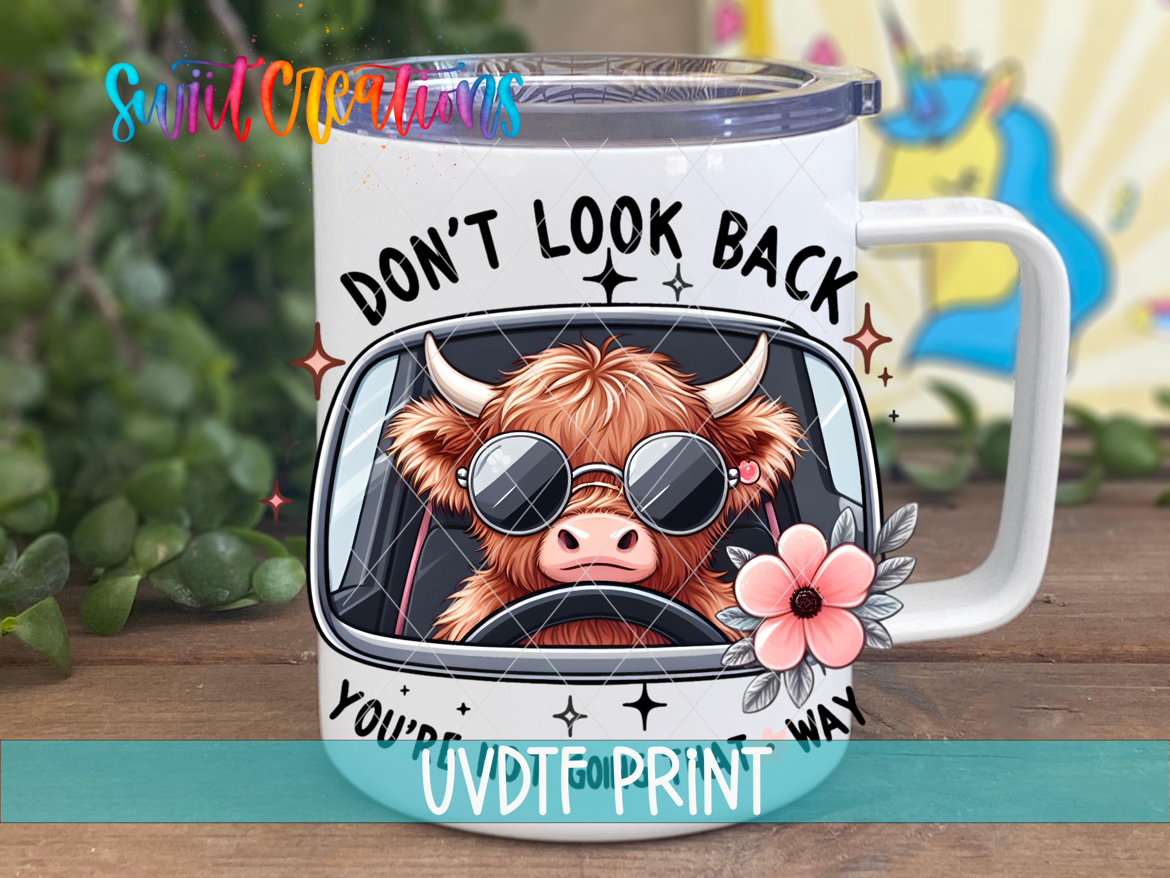 A mug with a cartoon cow wearing sunglasses and driving a car, along with the text "DON'T LOOK BACK YOU'RE WAY" printed on it.