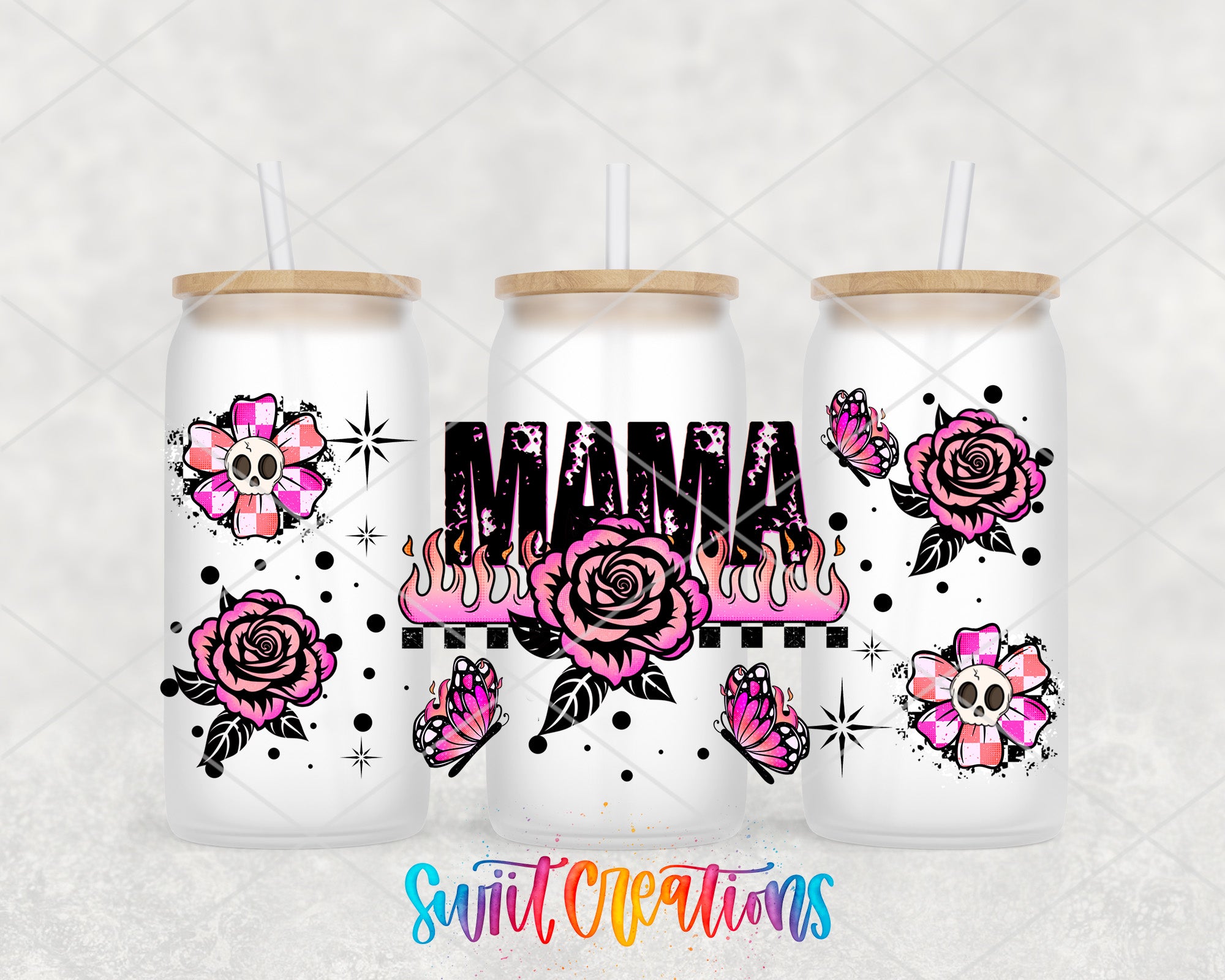 A trio of white tumblers with floral and skull designs, each featuring a straw. The tumblers are arranged in a row, with the middle one having a larger design. The text "Mama" is prominently displayed on the tumbler in the center.