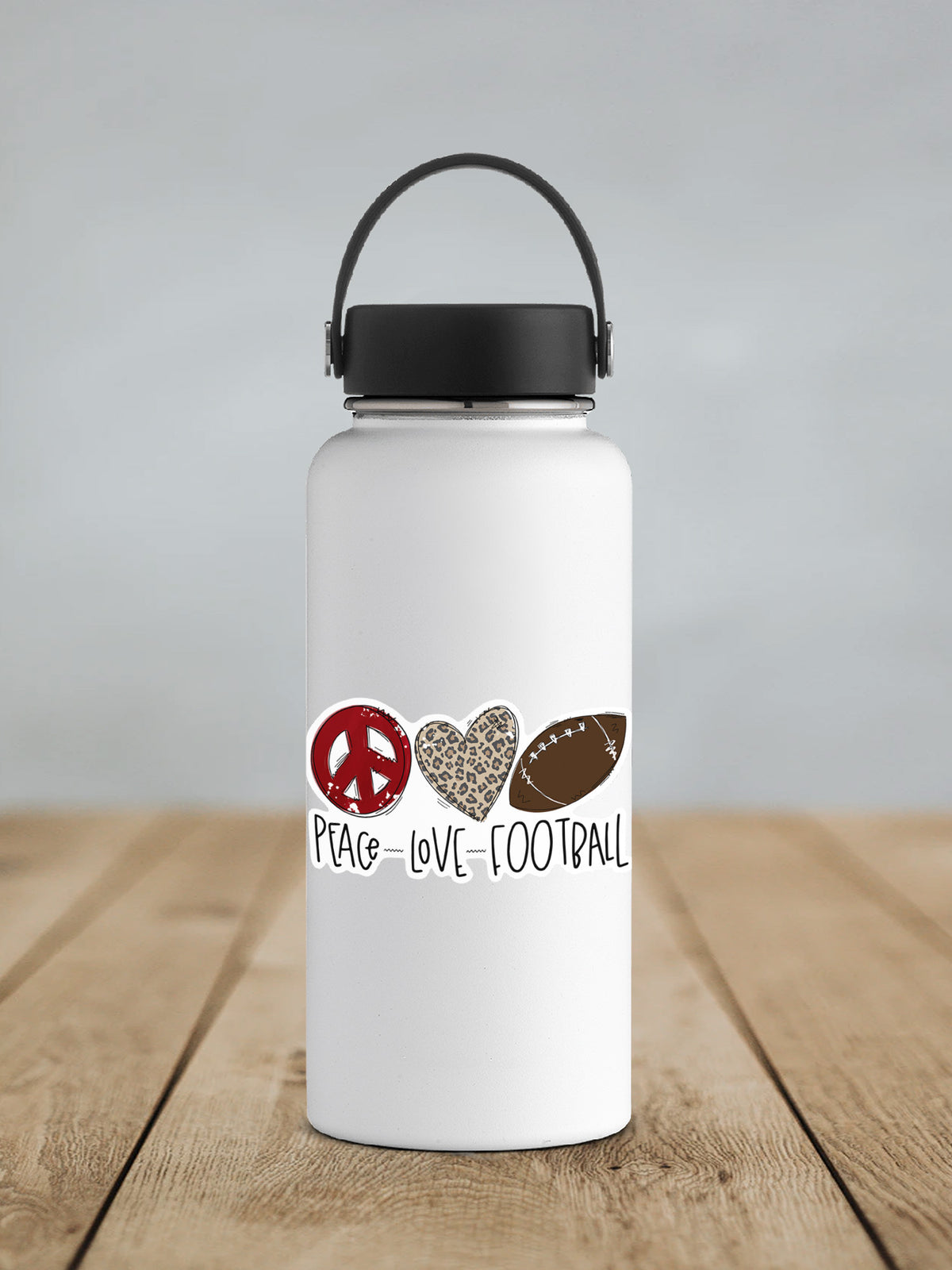 a white water bottle with a peace love football design