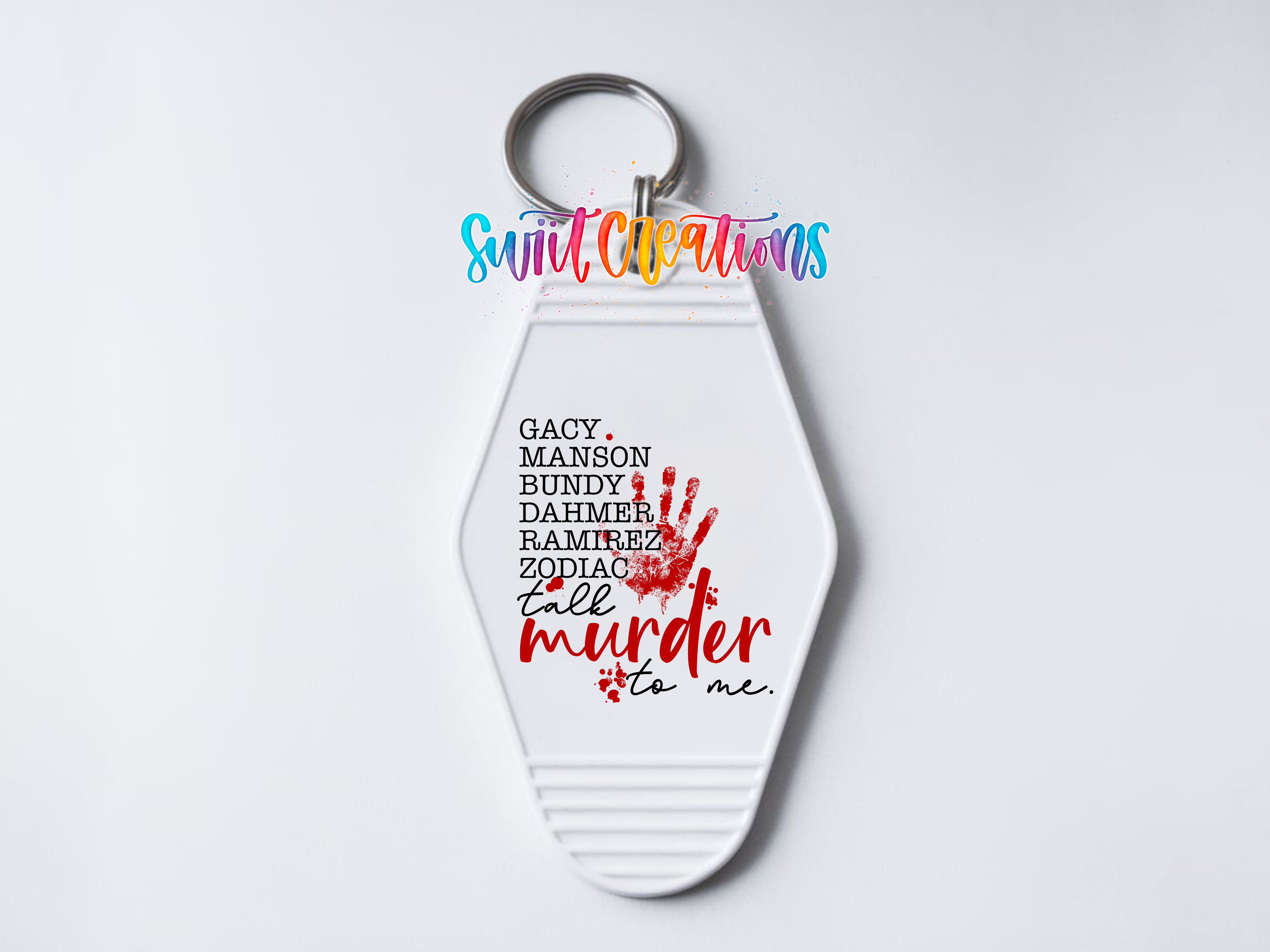 A keychain with a white hexagonal shape and a red handprint design. The text on the keychain reads "GACY MANSON BUNDY DAHLER RAMMER ZODIAZ TALL MURDER TO ME."