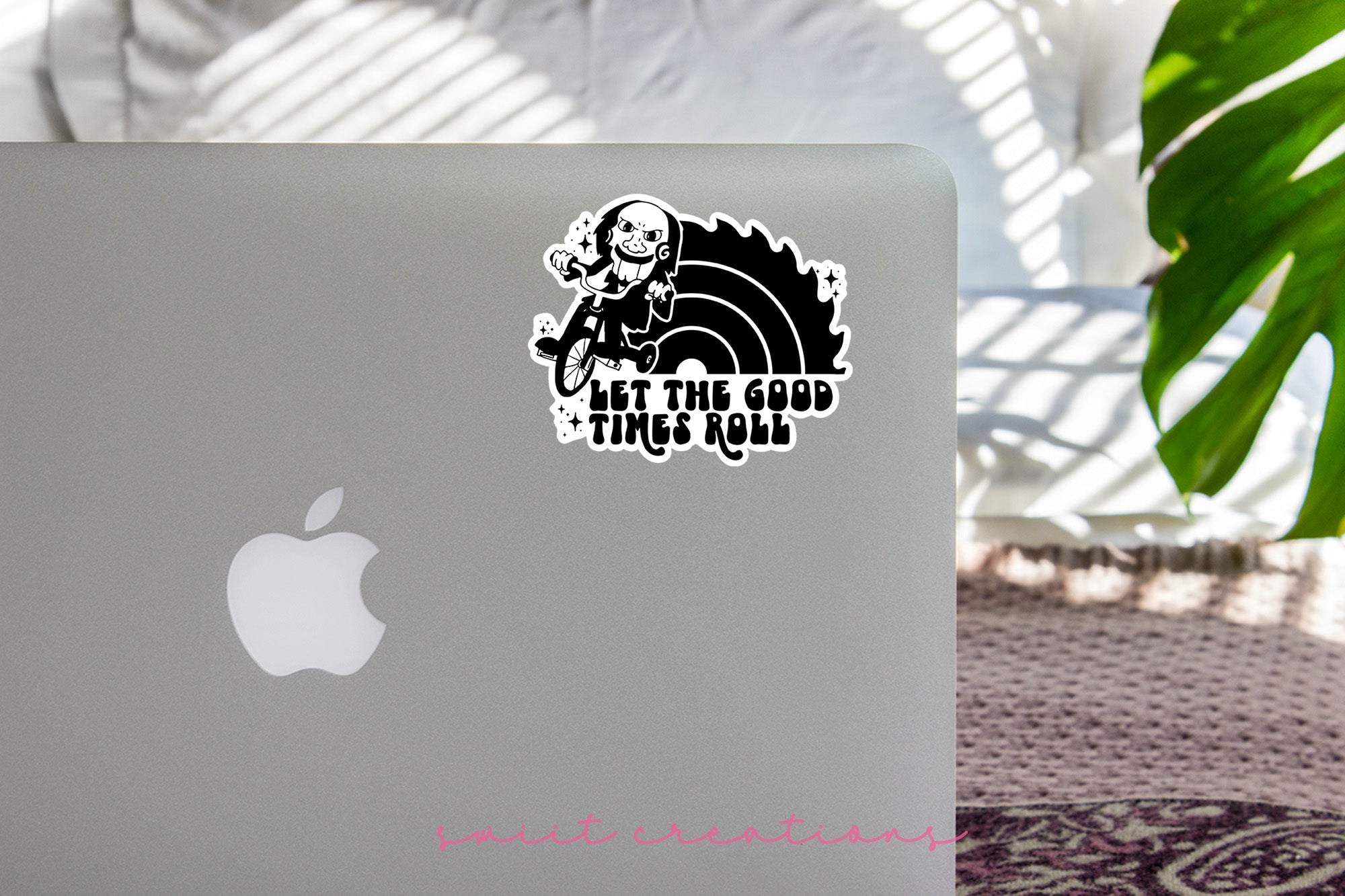 a laptop computer sitting on top of a table