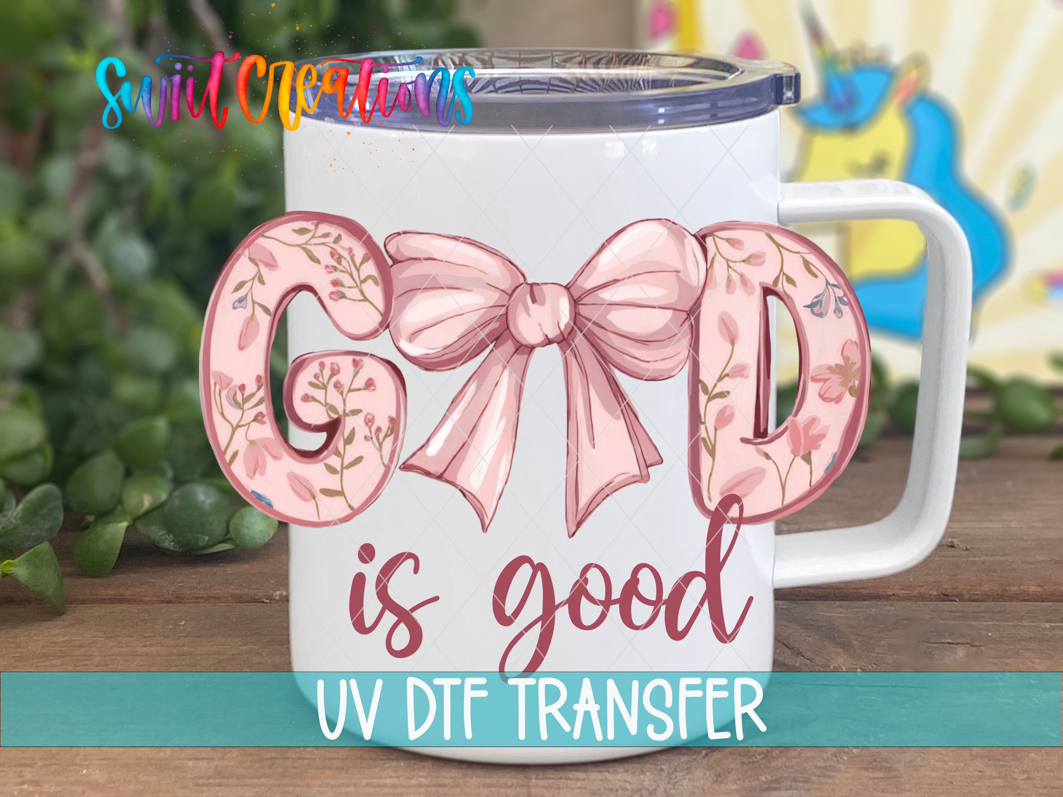 A white mug with a floral design and the text "GOOD is good" printed on it, along with a UV DFT transfer logo.