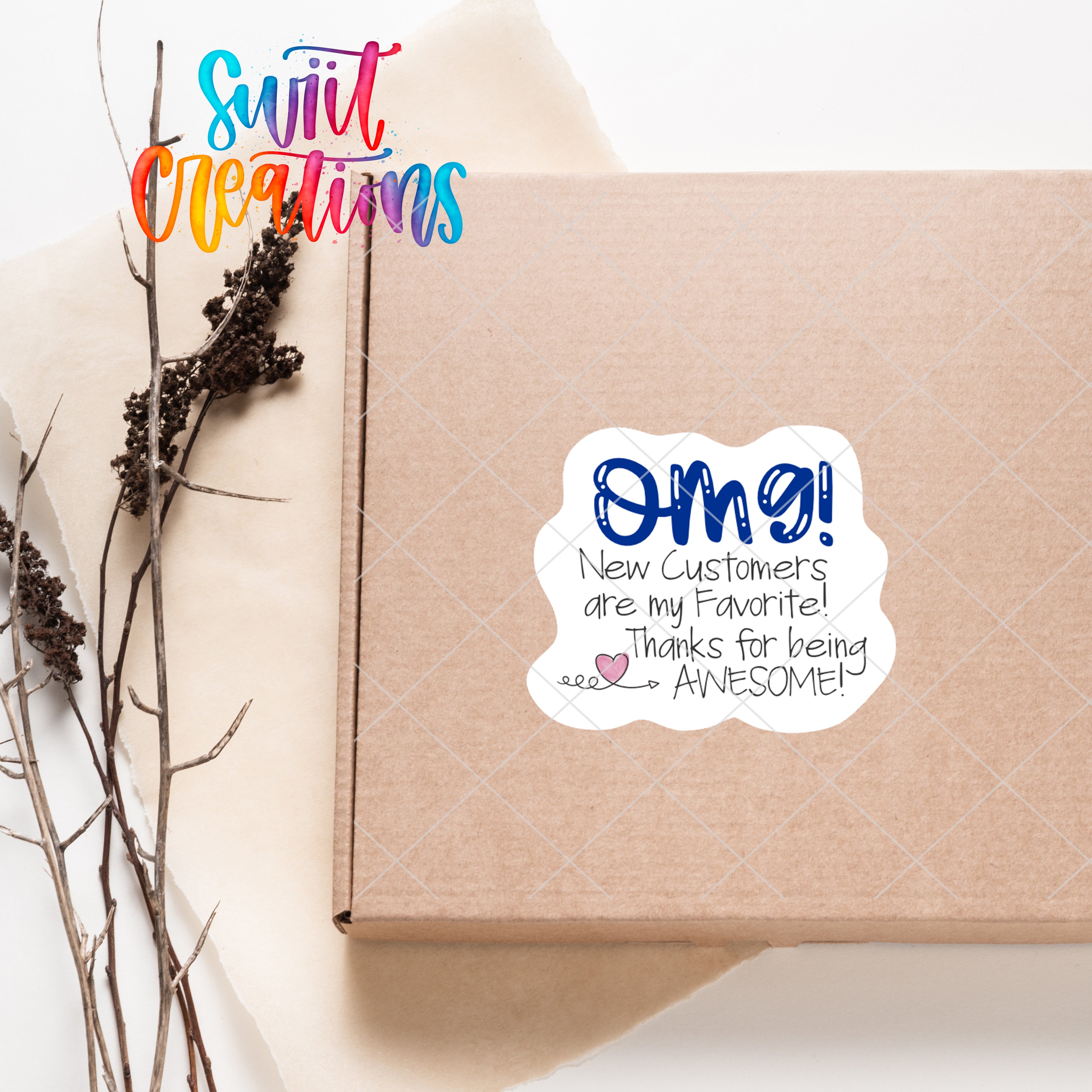 a box with a sticker on it sitting next to a plant