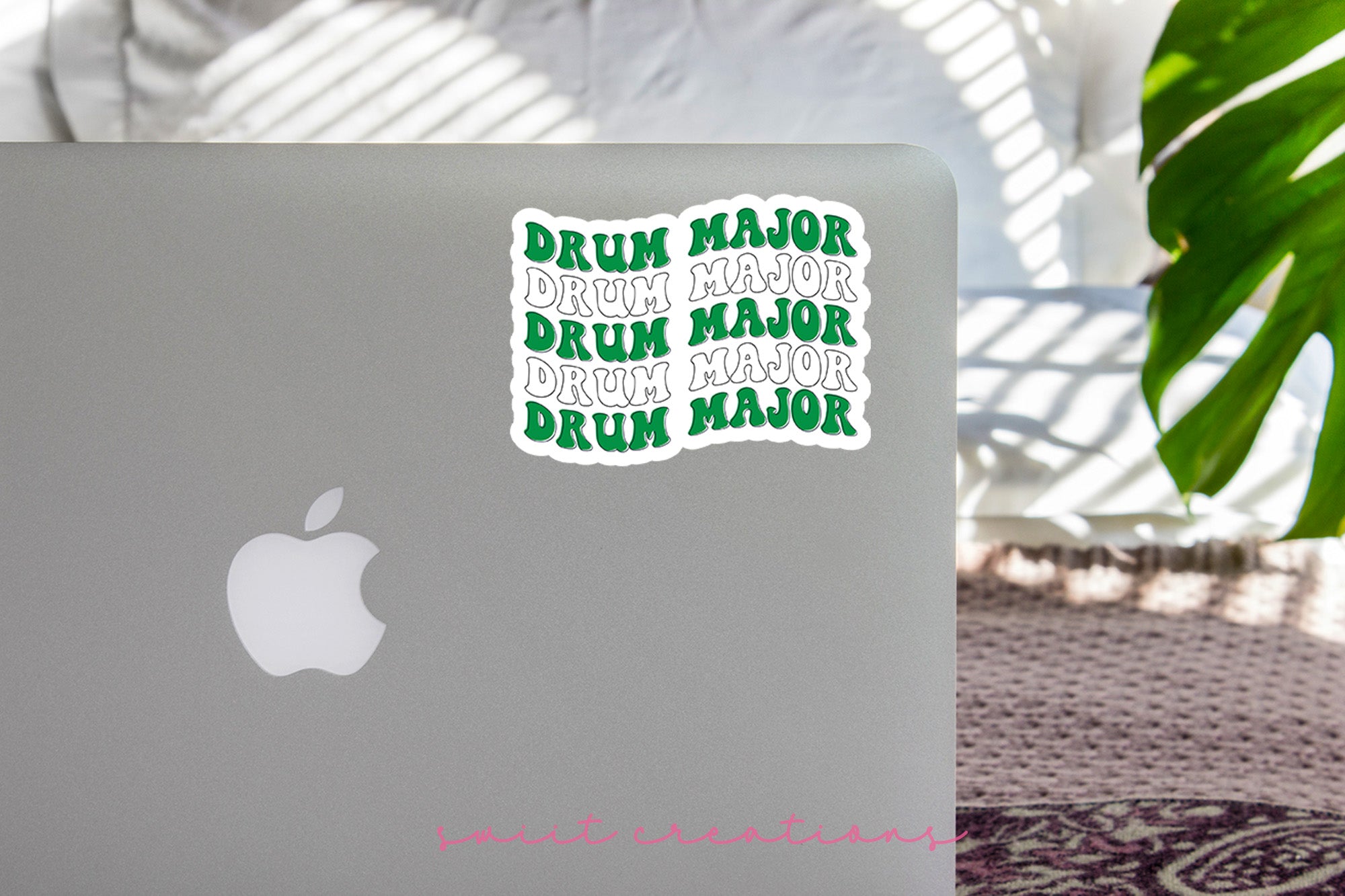 a laptop computer sitting on top of a table